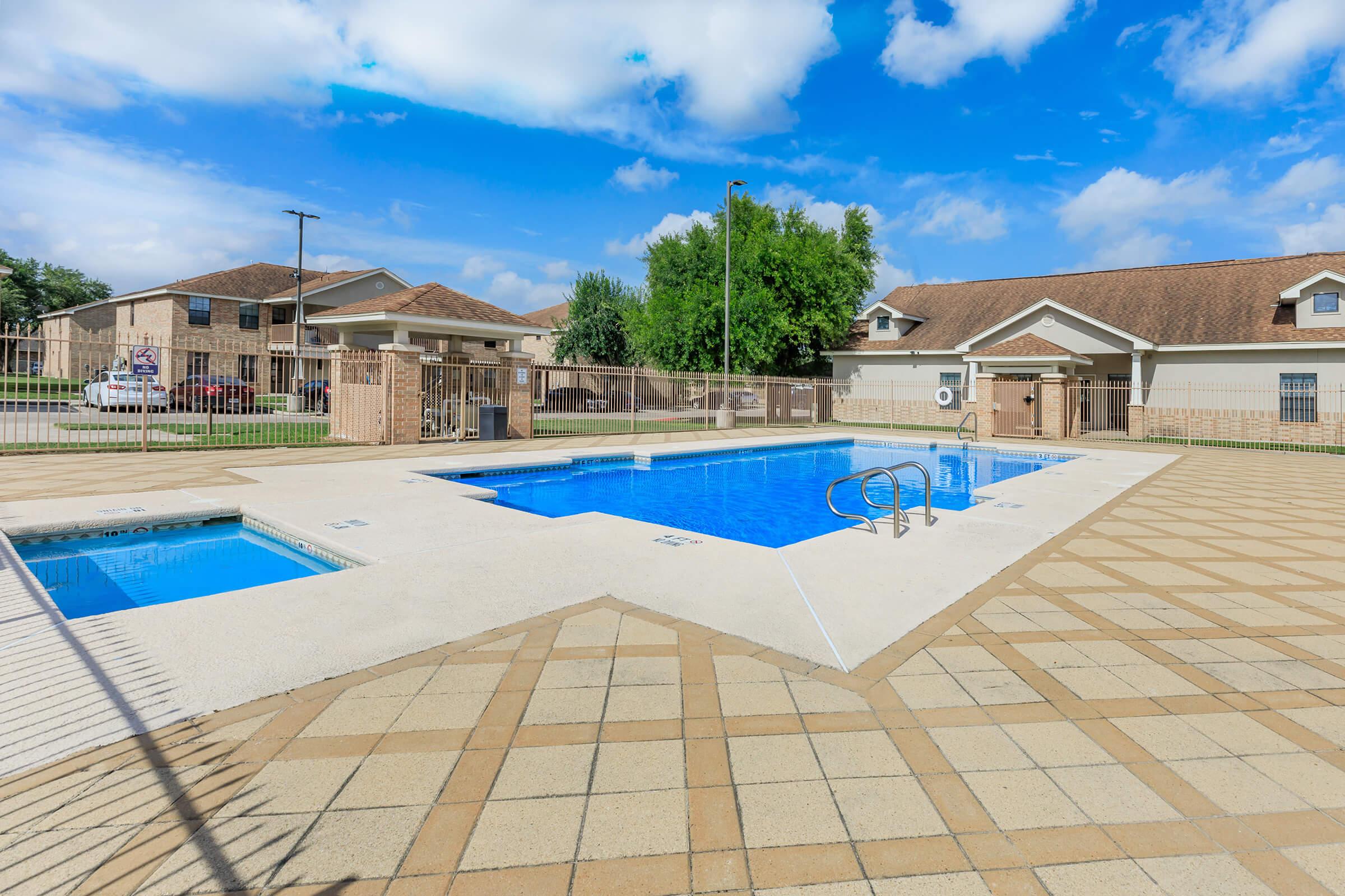 a pool next to a building