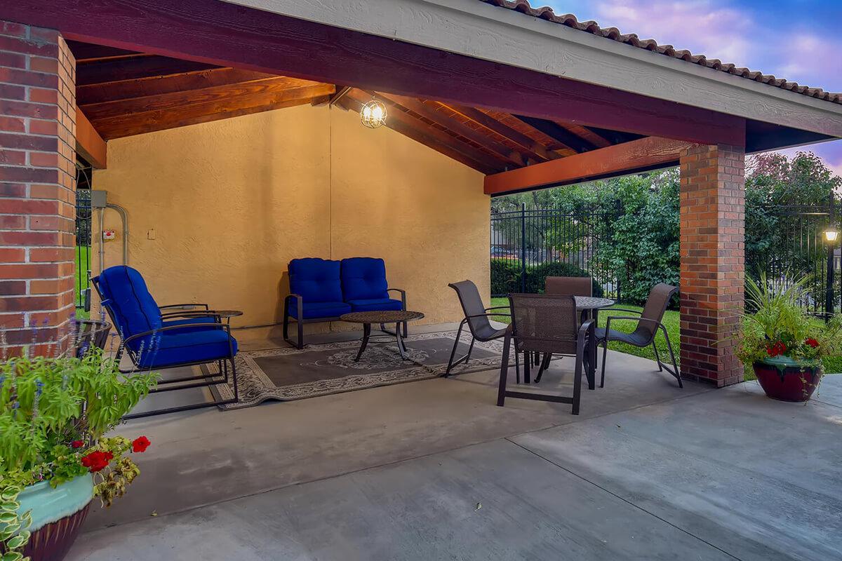 a chair sitting in front of a house