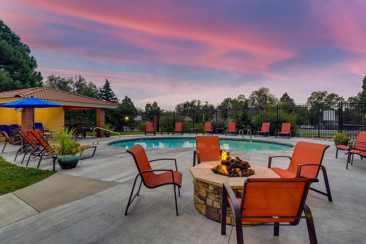 a group of lawn chairs sitting on top of a table