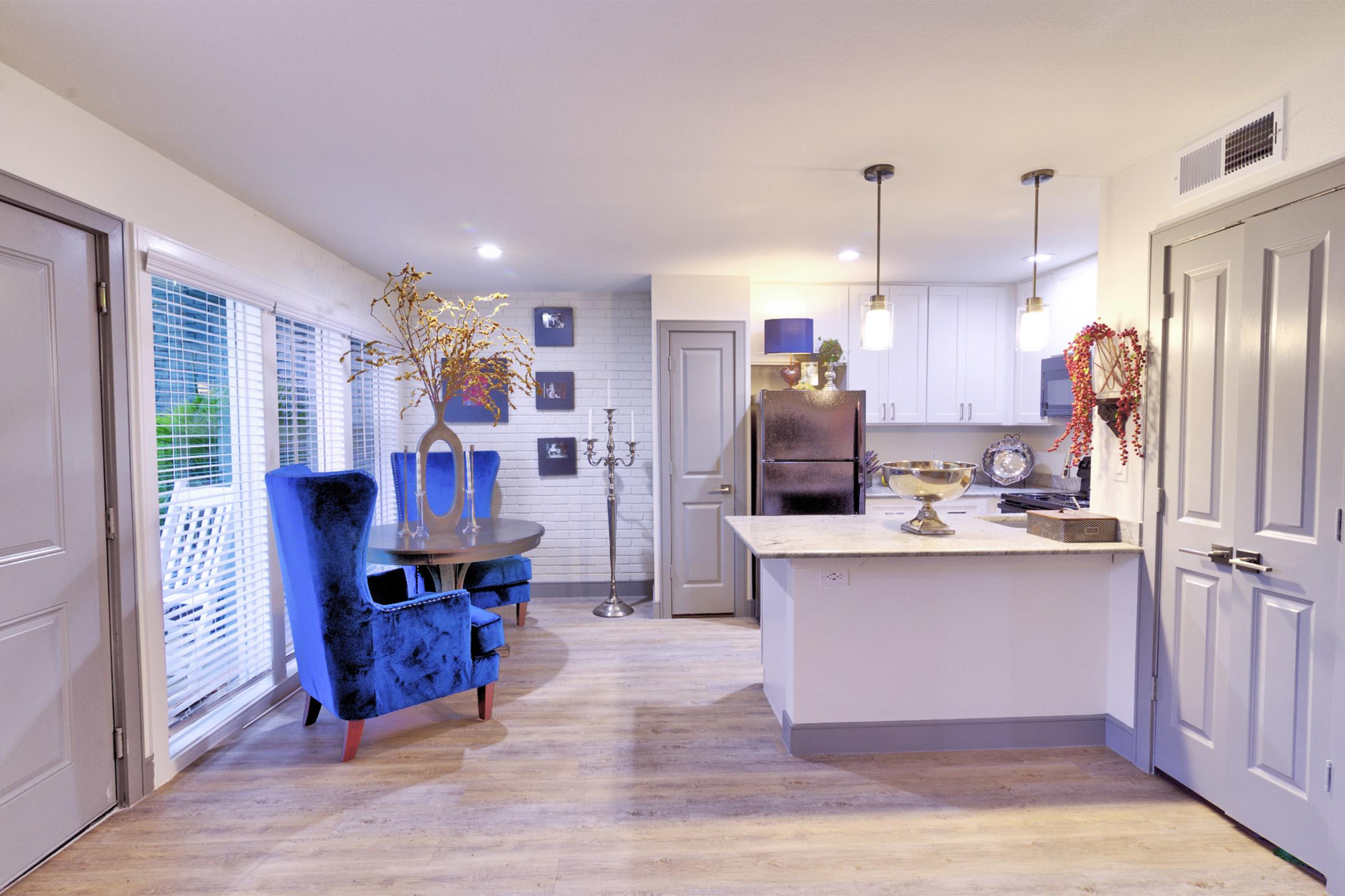 a kitchen with a wood floor