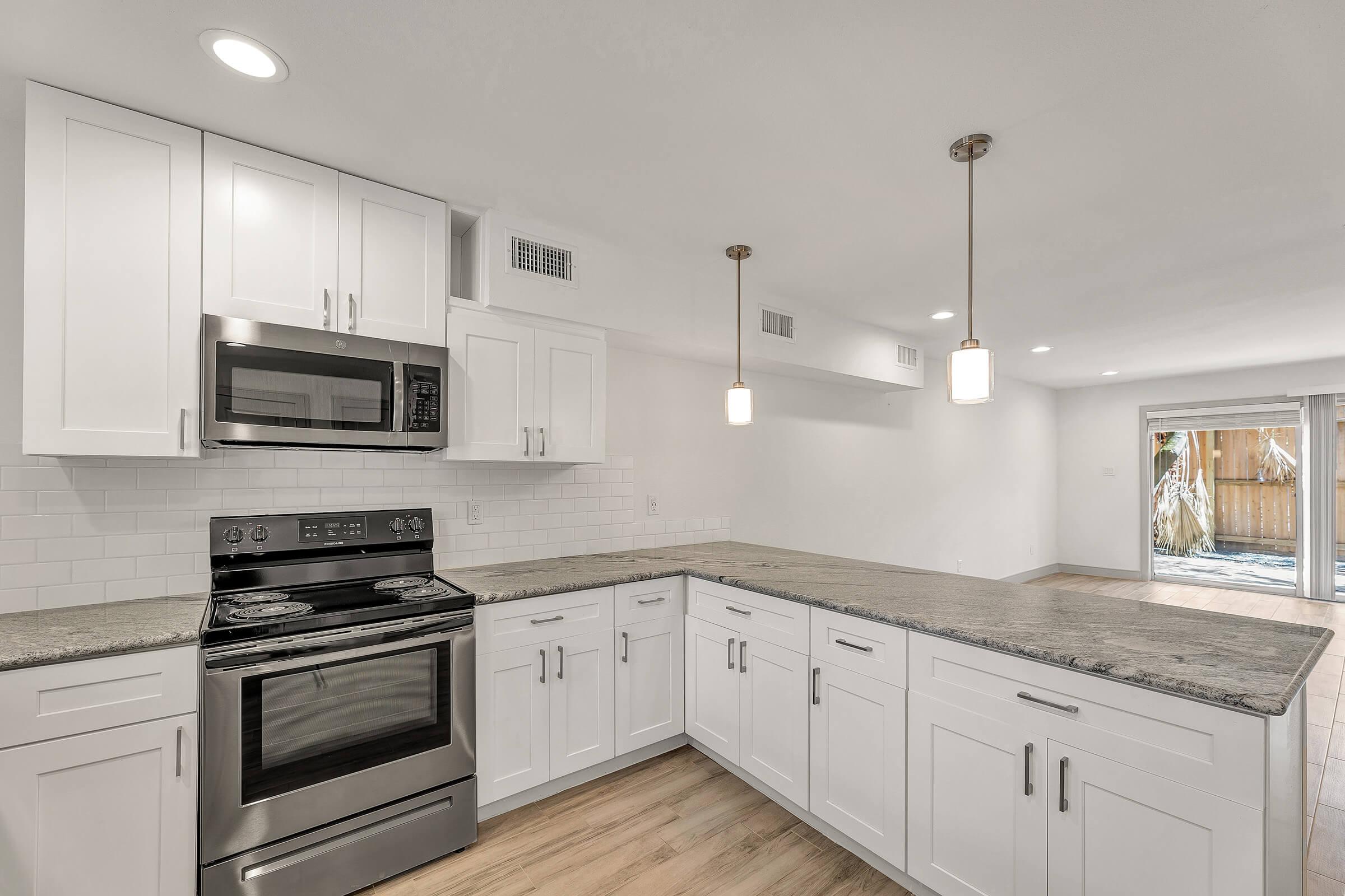 a kitchen with stainless steel appliances