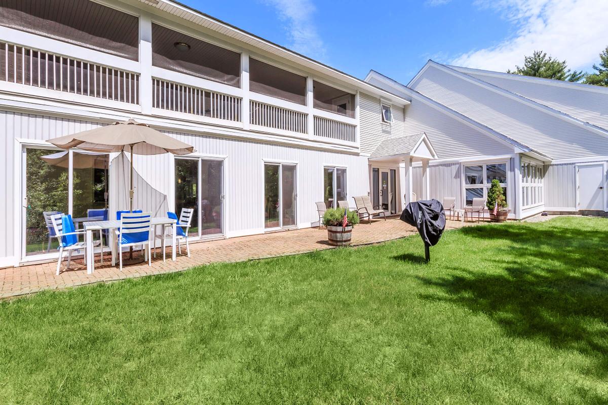 a large lawn in front of a building