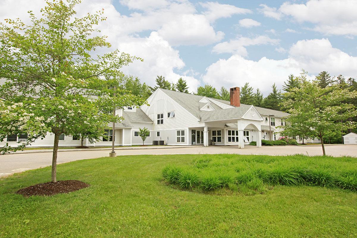 a large lawn in front of a house