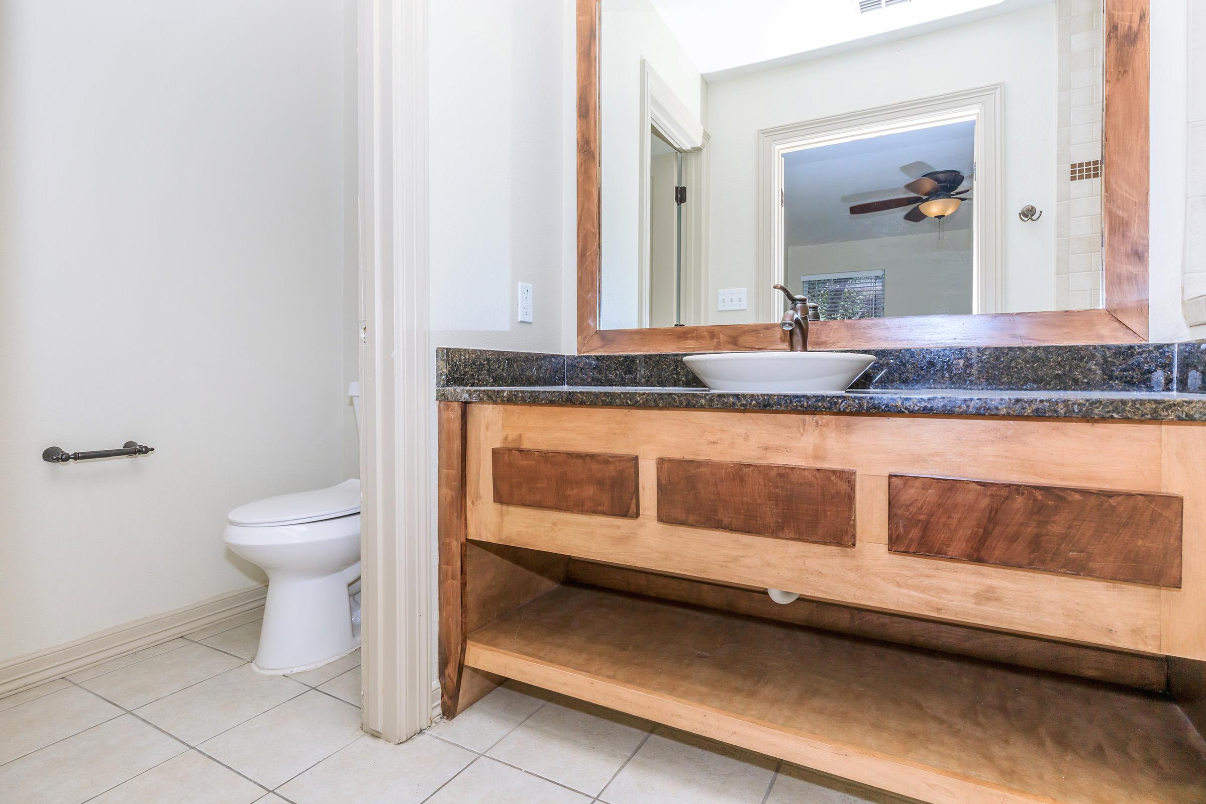 a room with a sink and a window