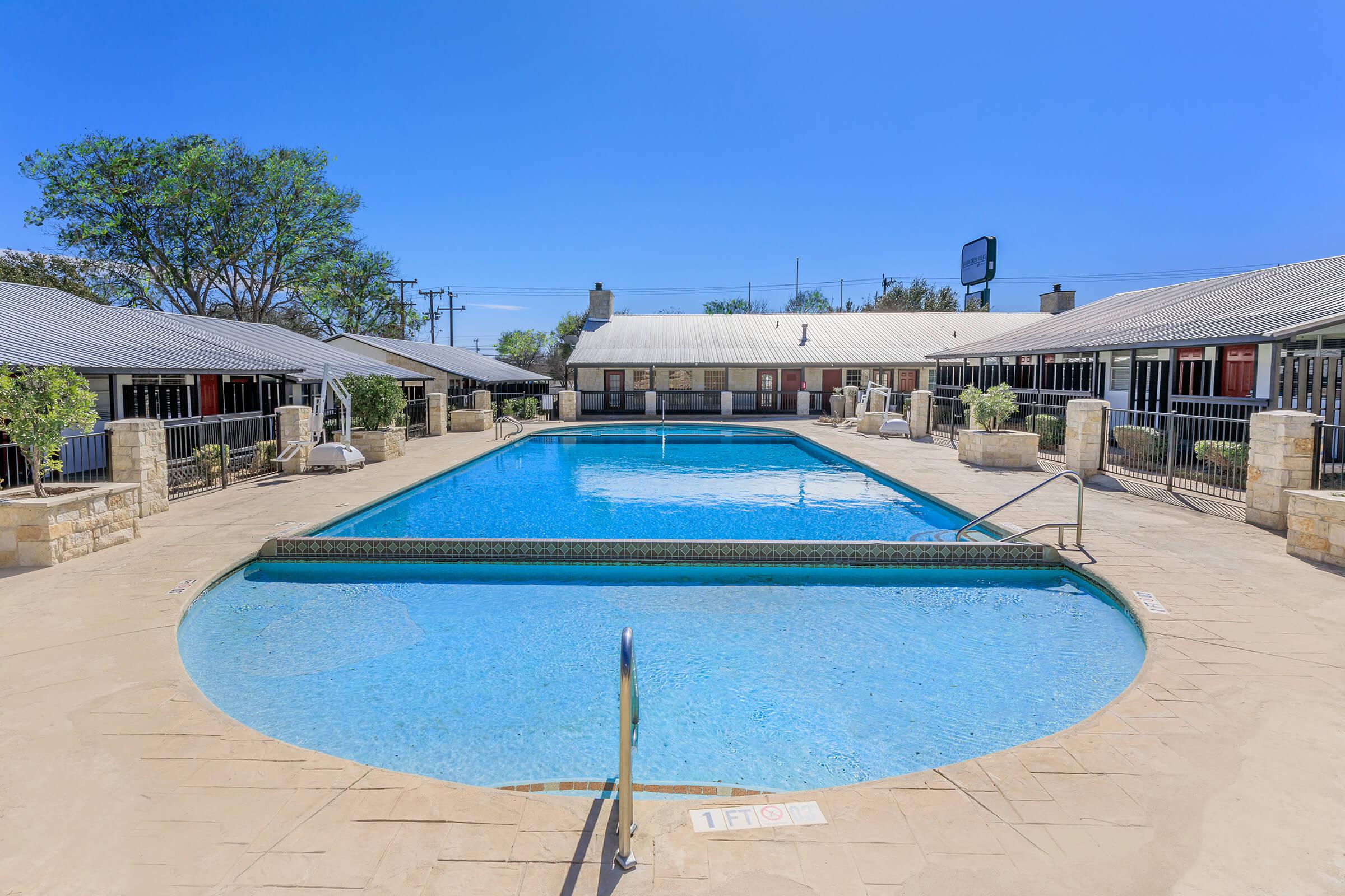 a pool next to a building