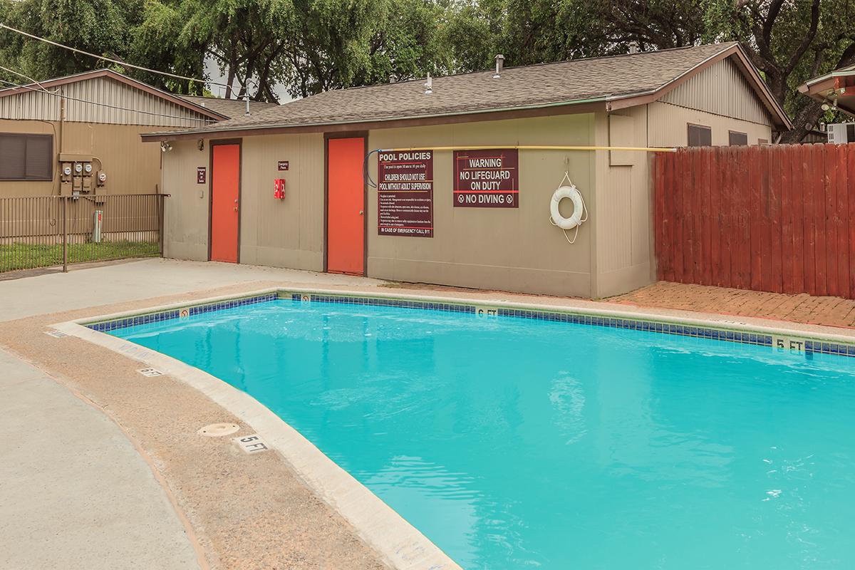 a small house in a pool of water