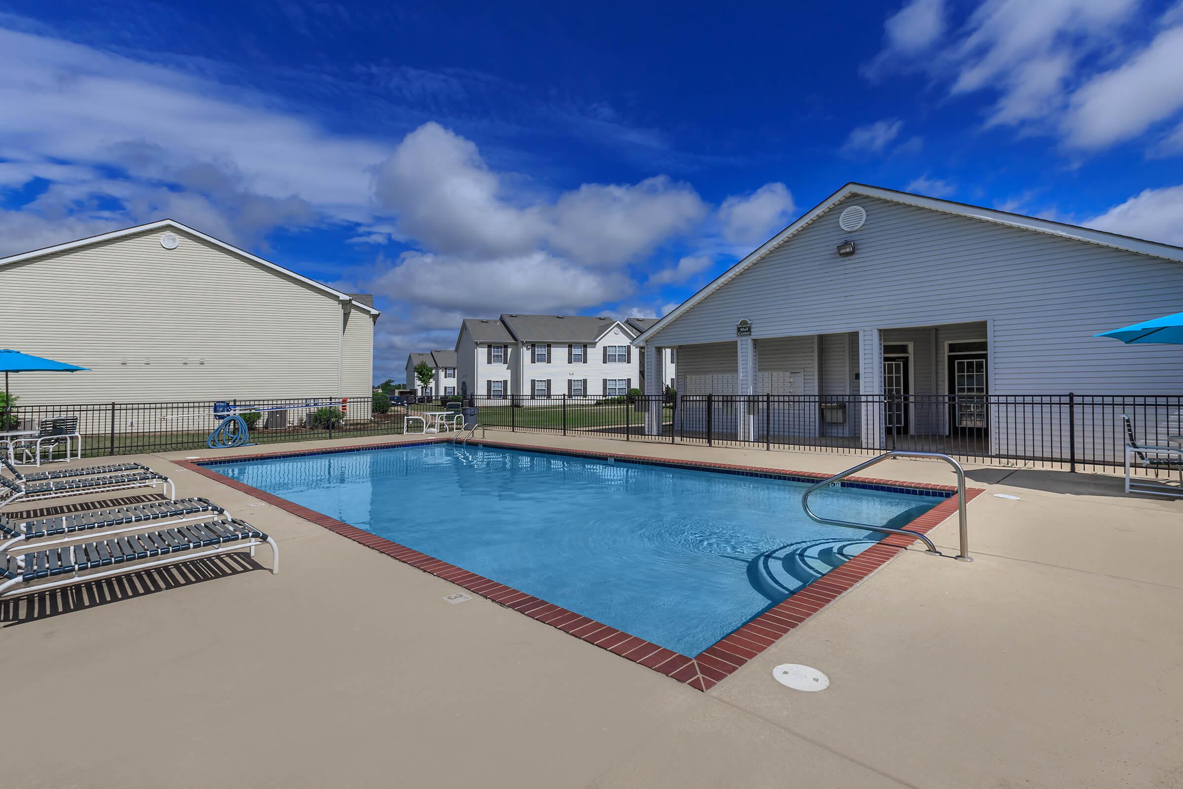 a pool next to a building