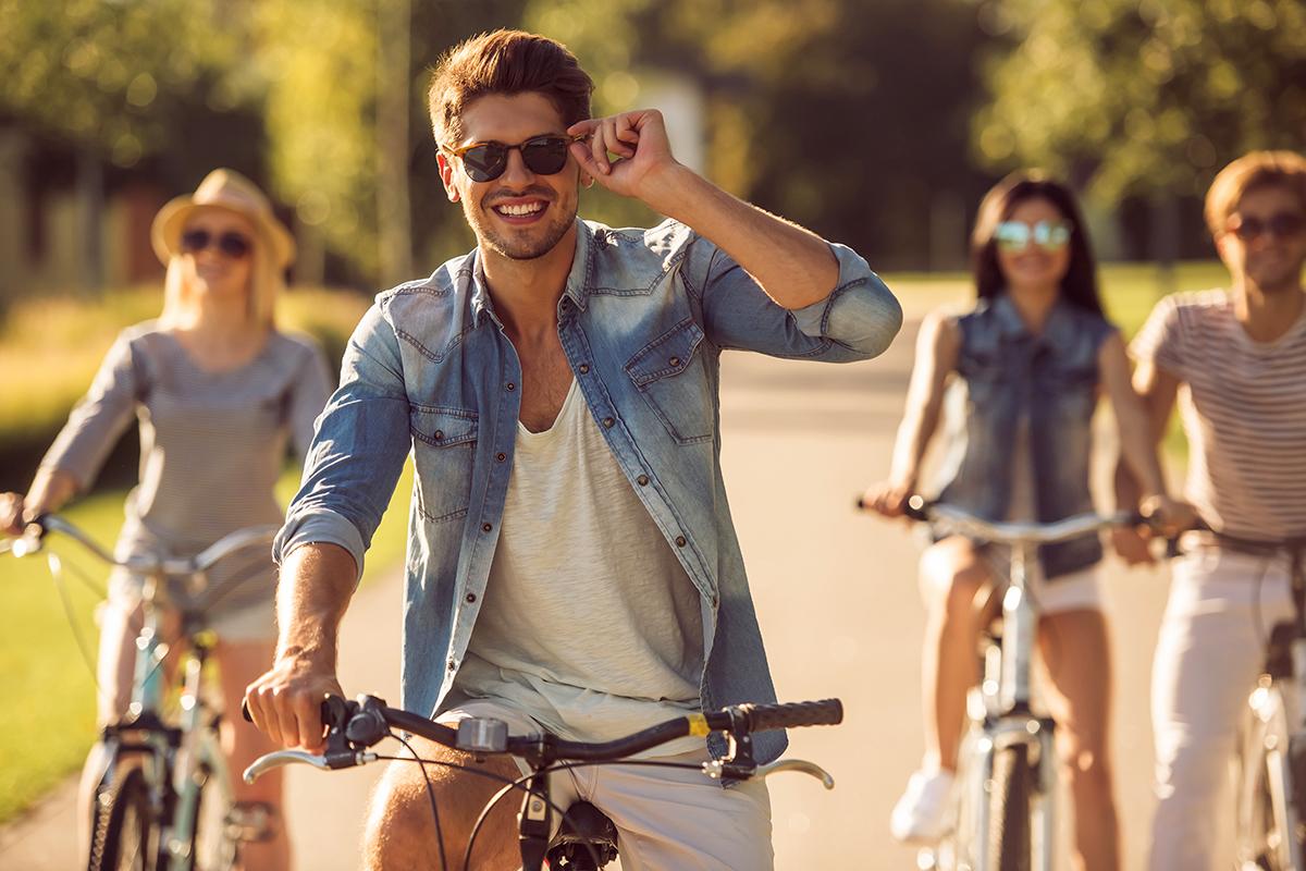 Friends cycling in park.jpg