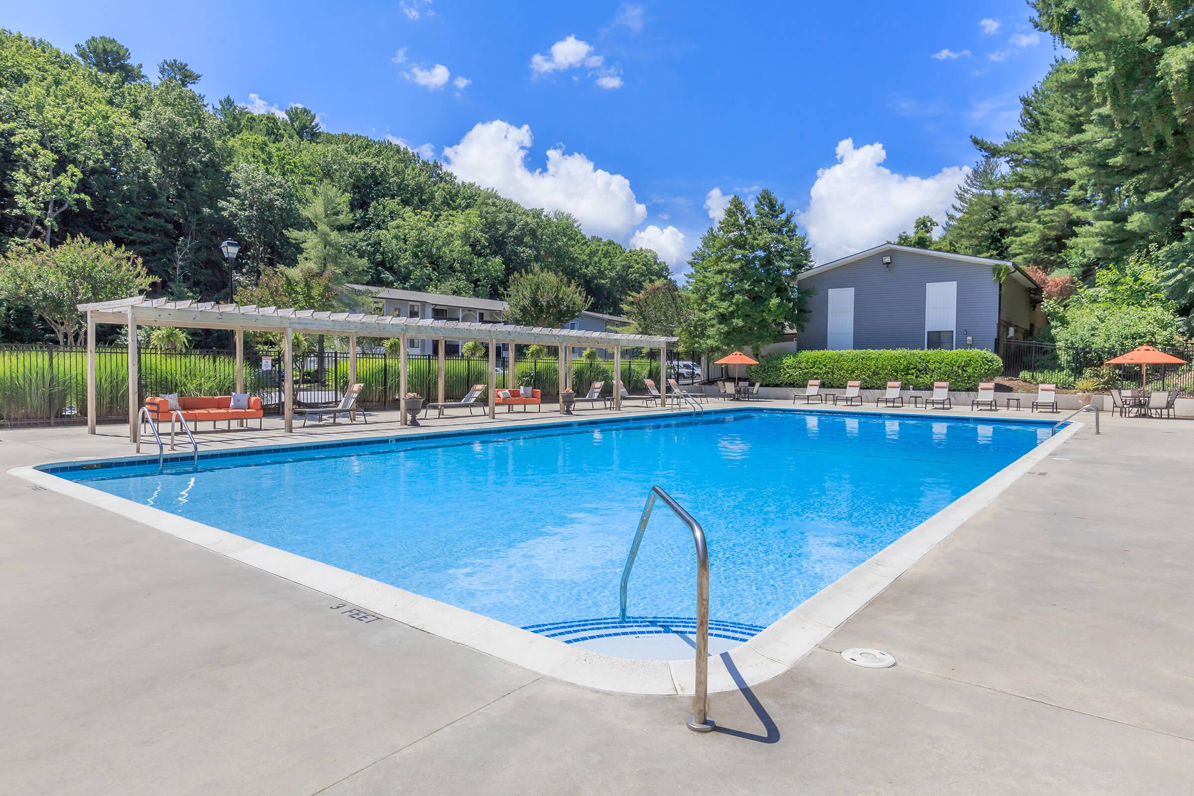 a pool next to a body of water