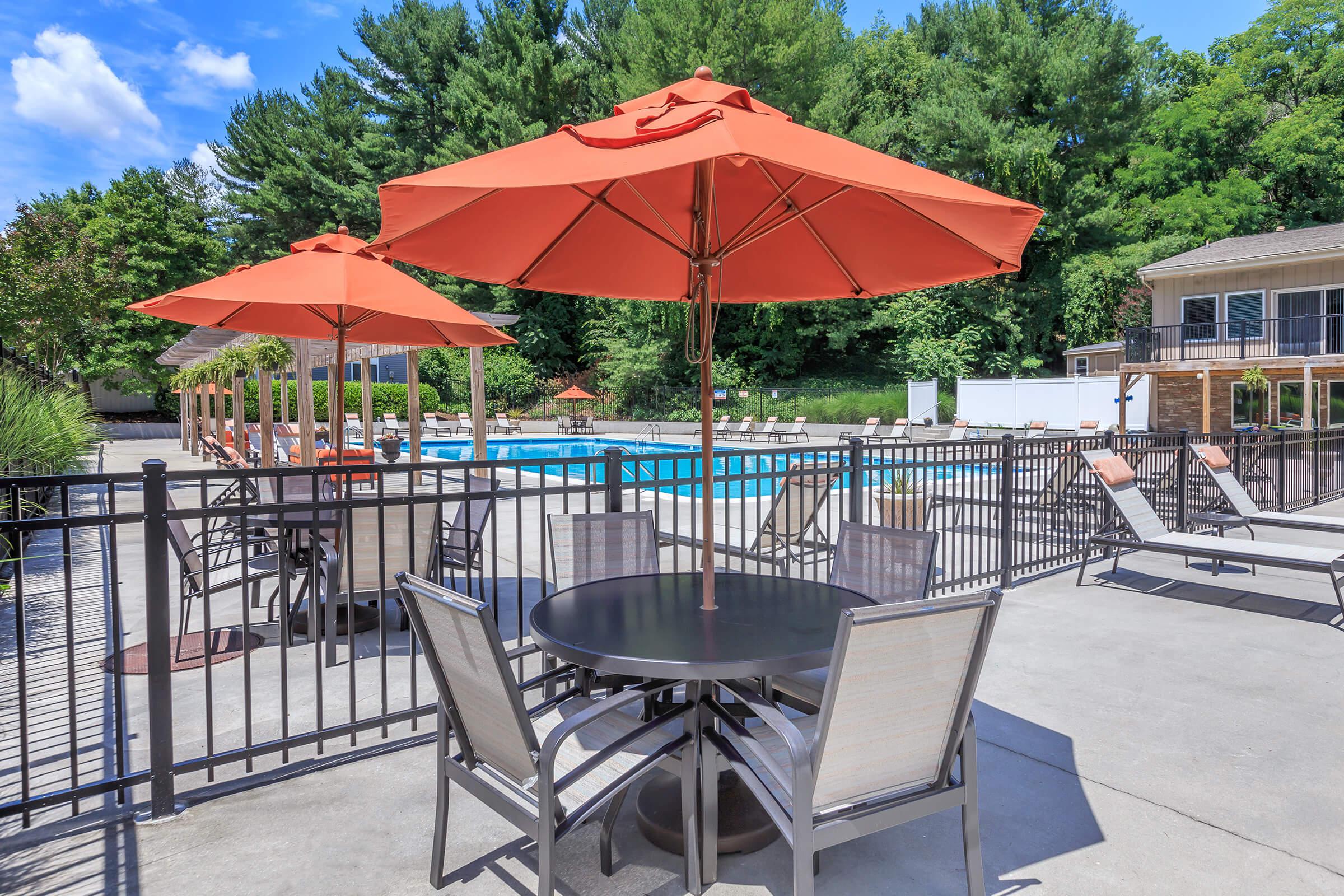 a lawn chair under an umbrella