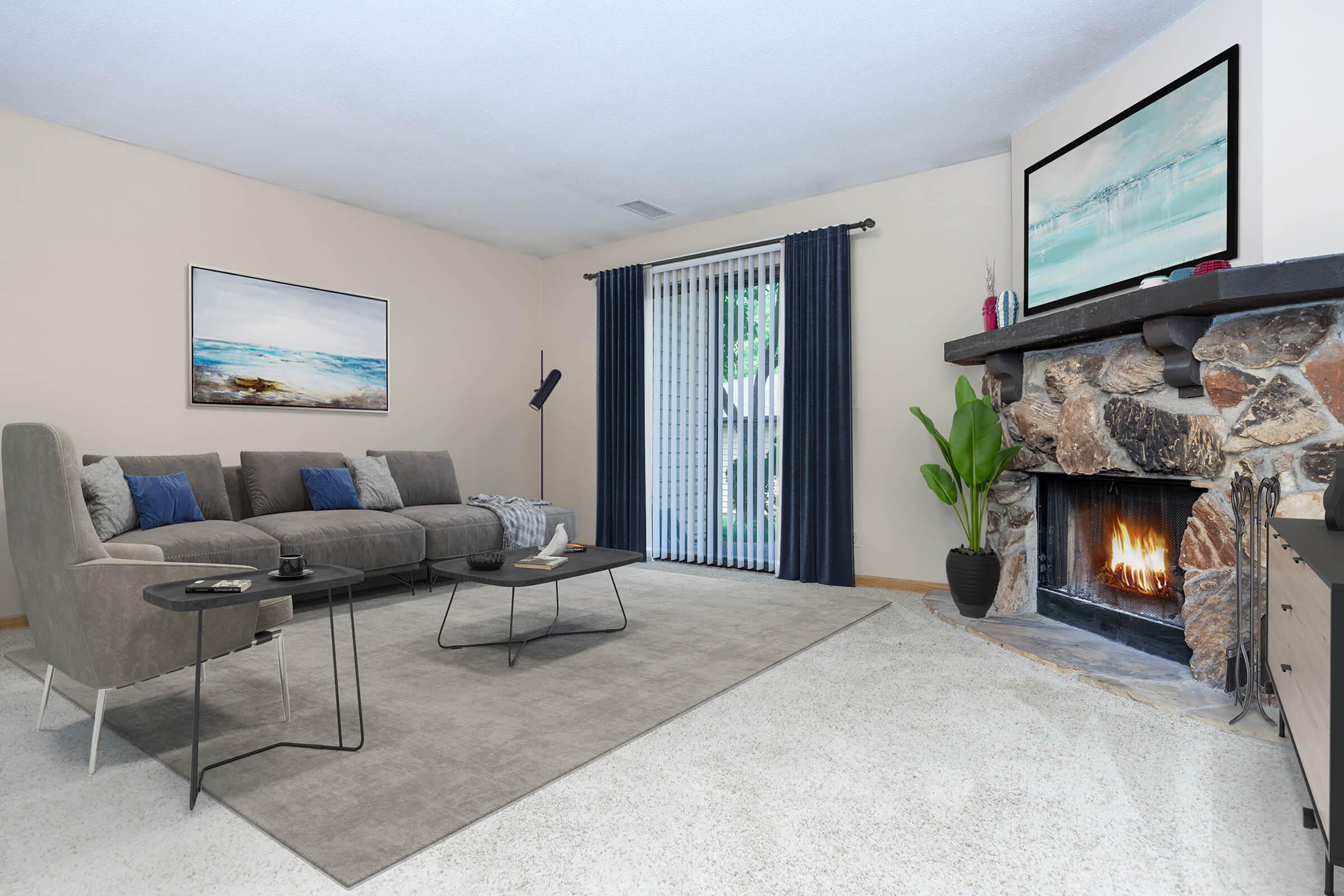 a living room filled with furniture and a flat screen tv