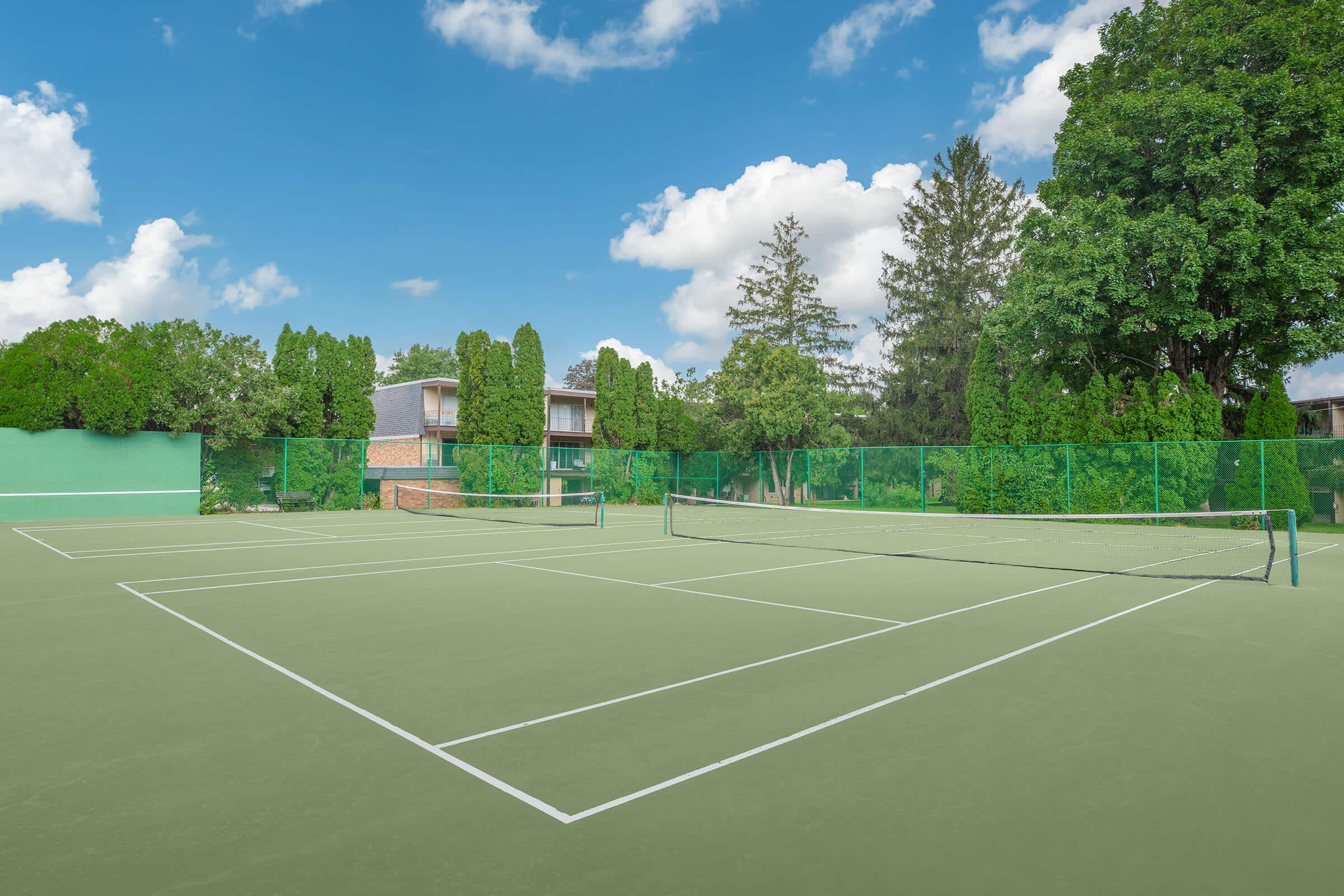 Outdoor tennis court at Homewood Manor Apartments in Moline, IL