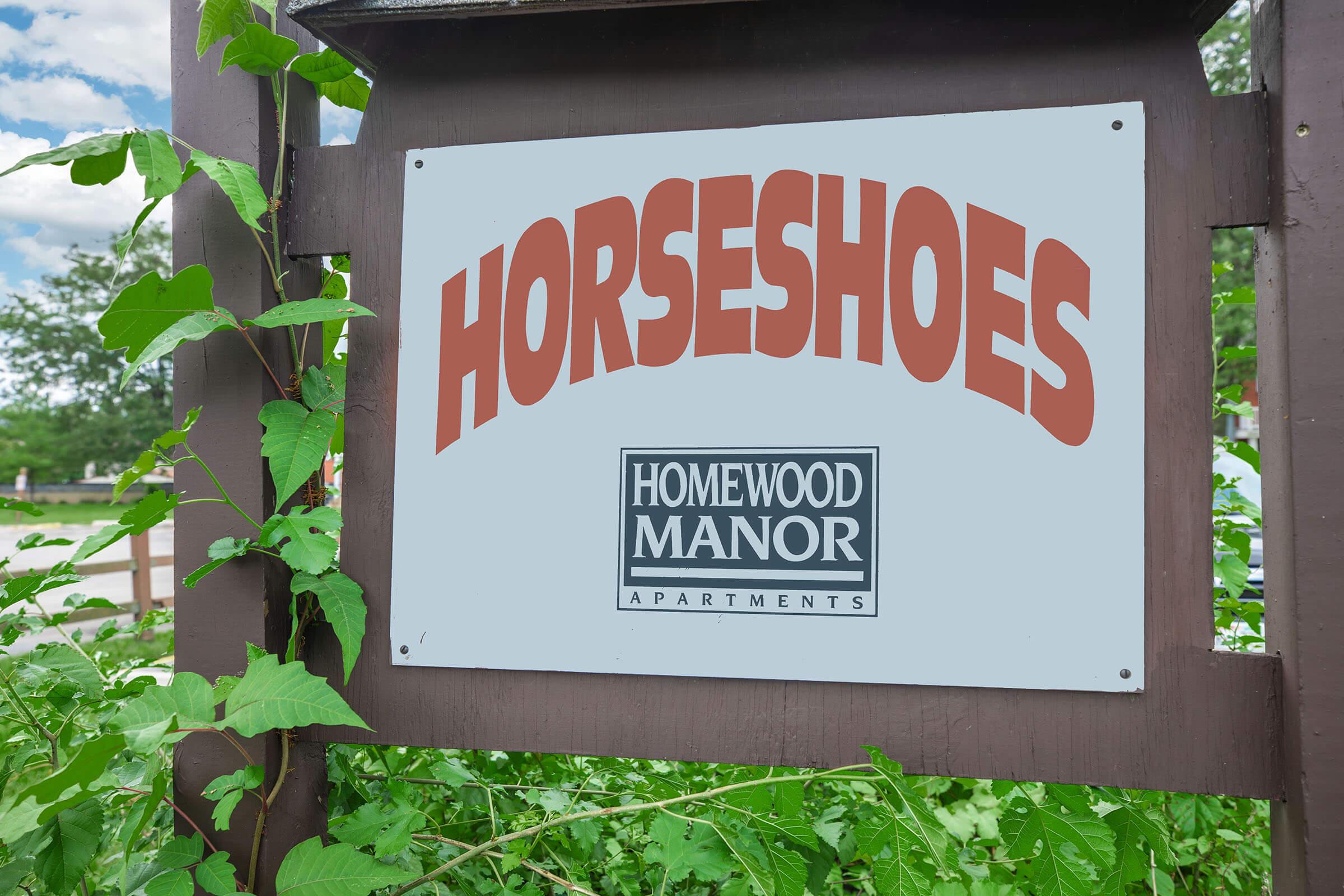 Horseshoes sign near recreation area at Homewood Manor Apartments in Moline, IL