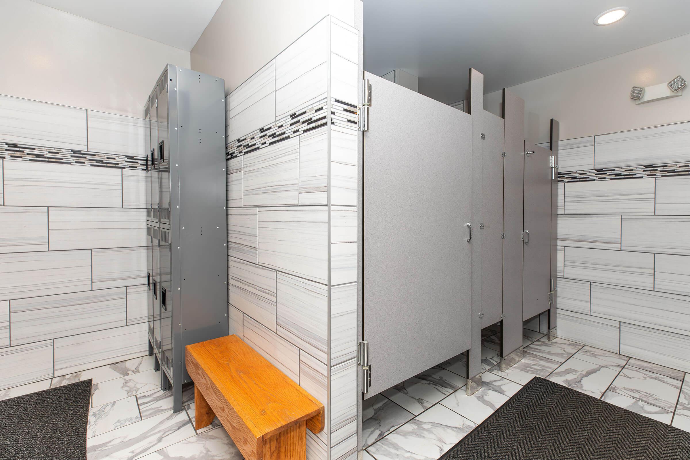 Updated resident locker room with showers at Homewood Manor Apartments in Moline, IL