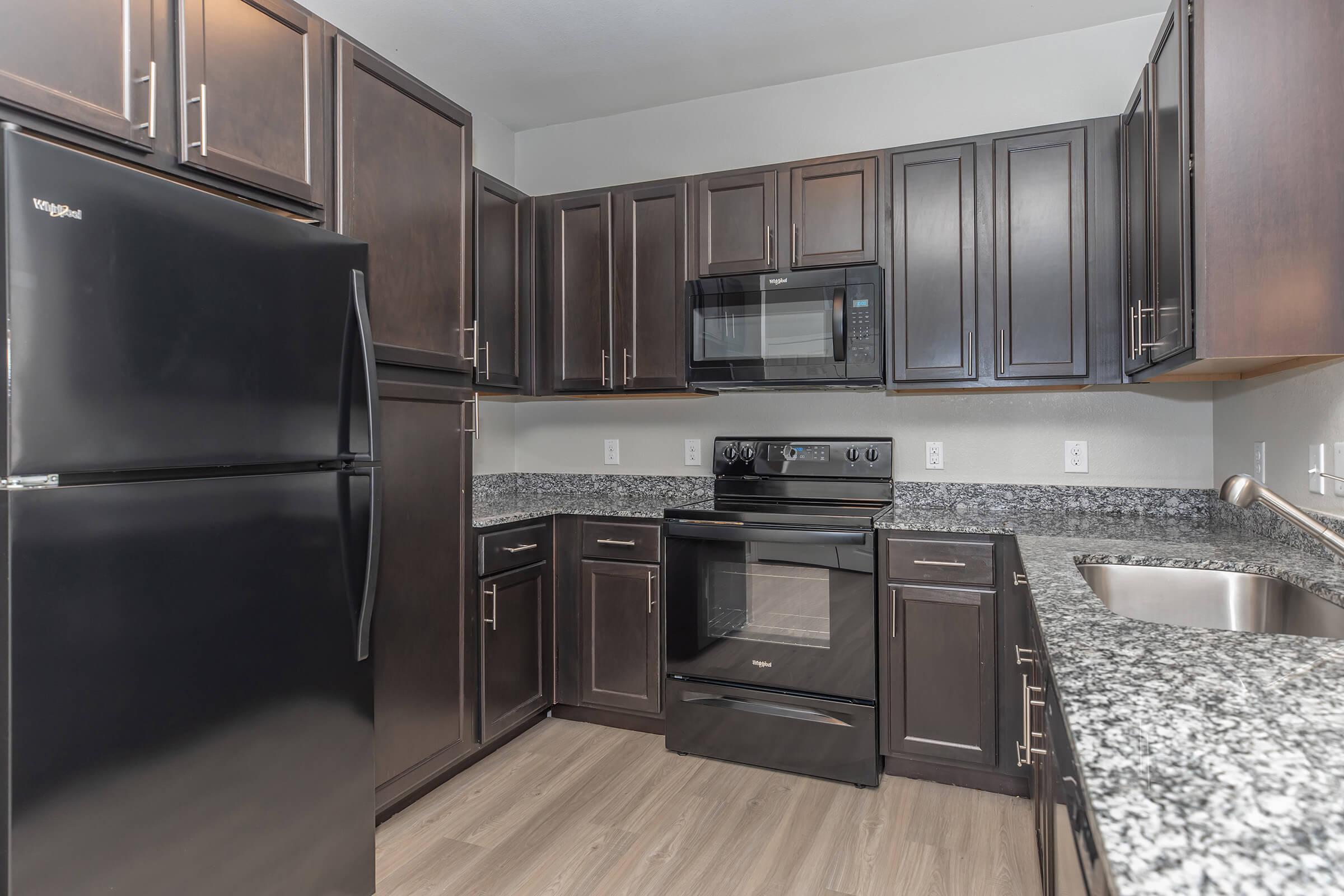 a modern kitchen with stainless steel appliances