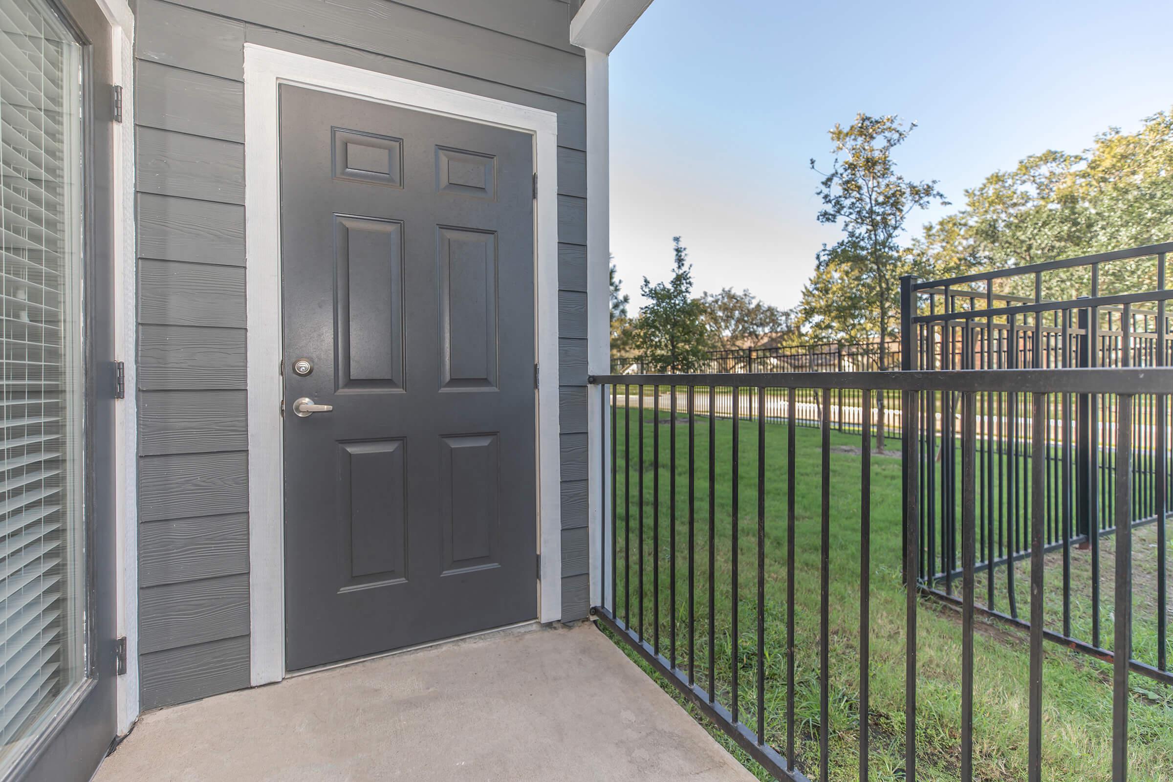 a gate in front of a building