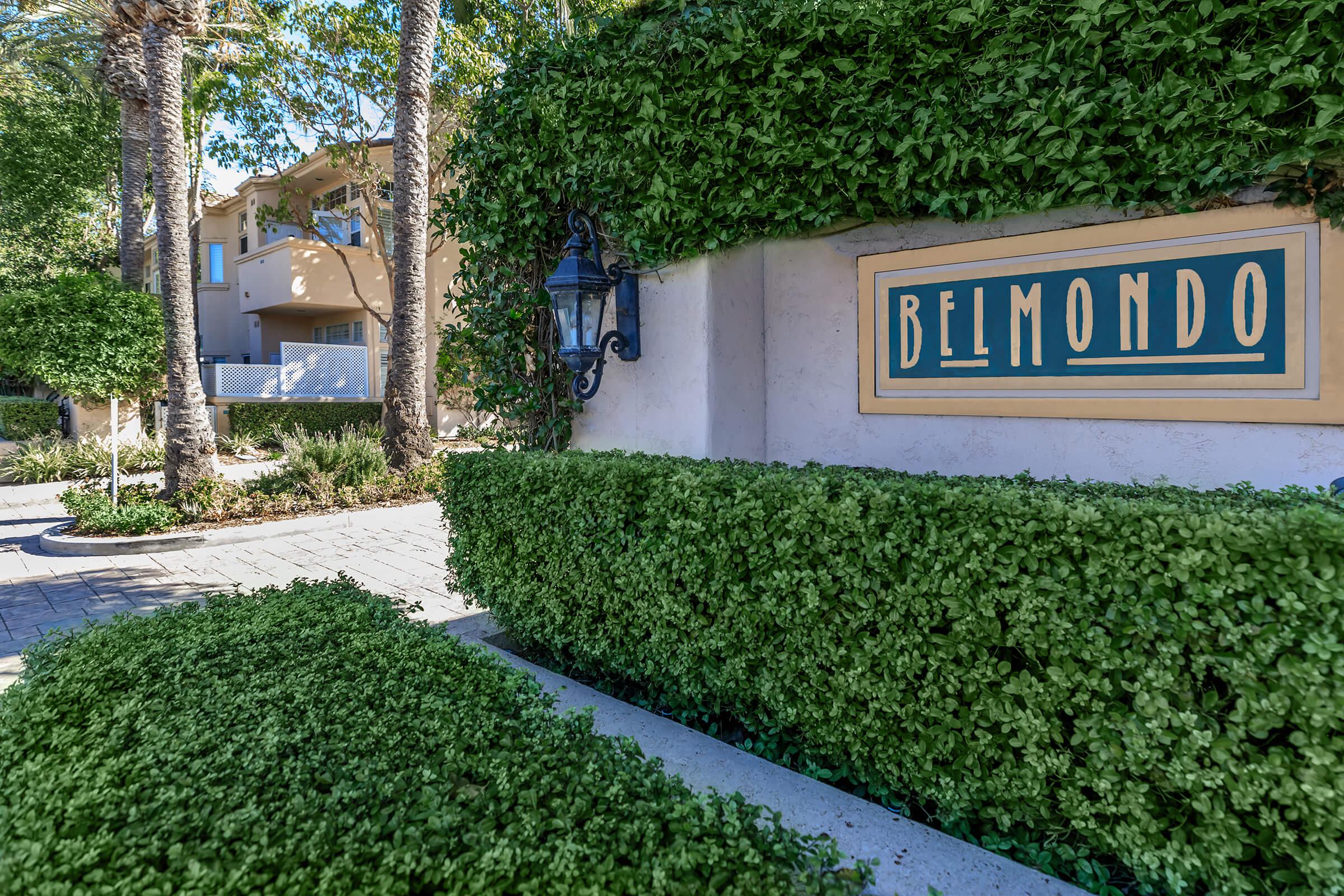 a sign in front of a house