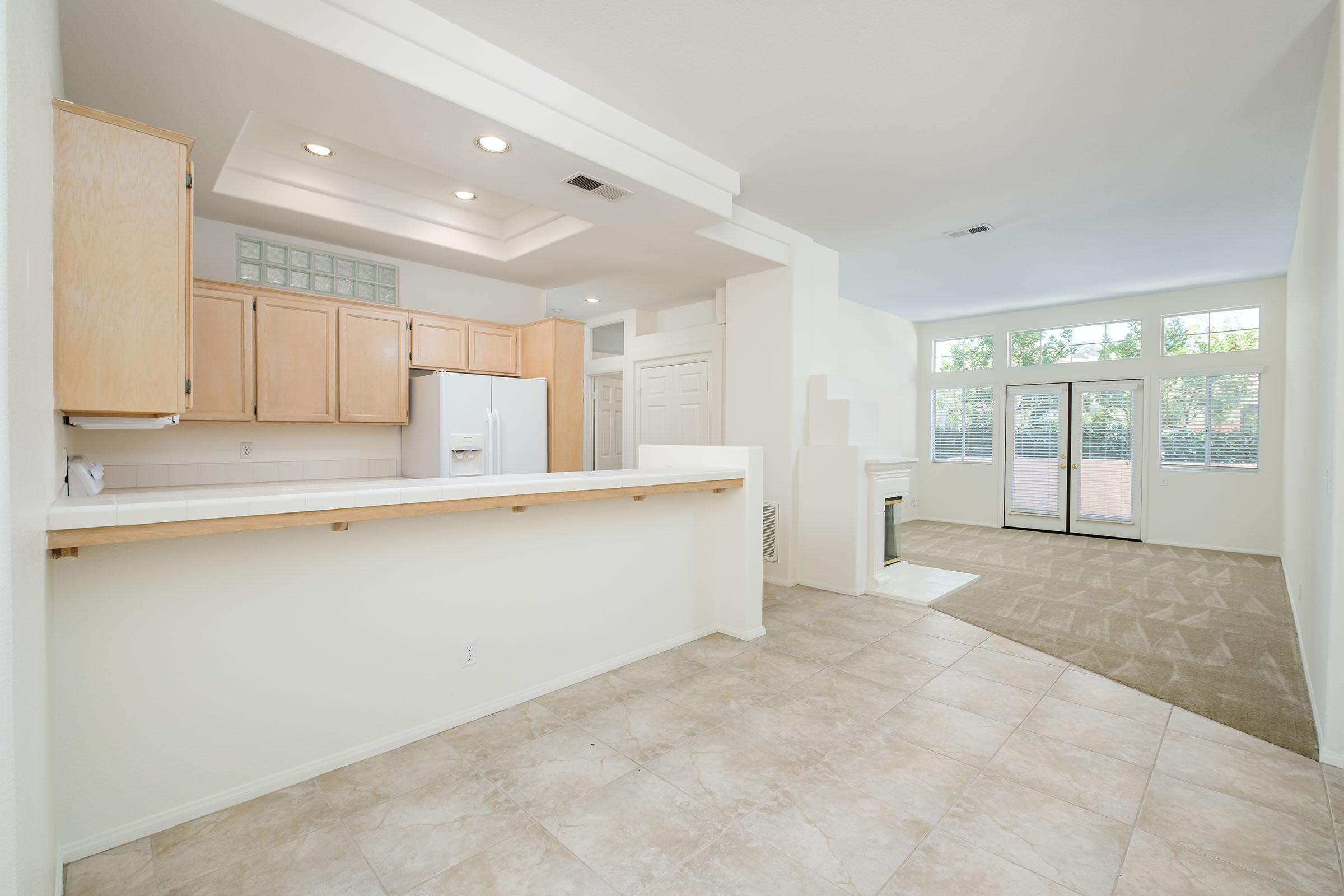 a kitchen with a wood floor