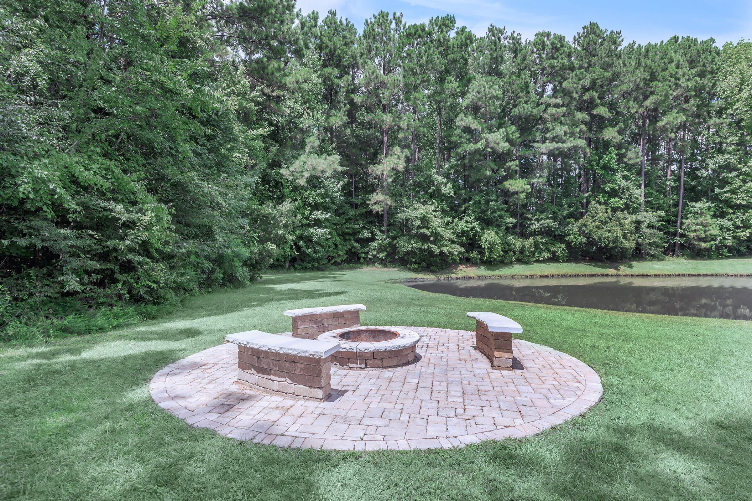 Cozy Up To The Fire Pit Here At Cooper's Ridge in Ladson, South Carolina