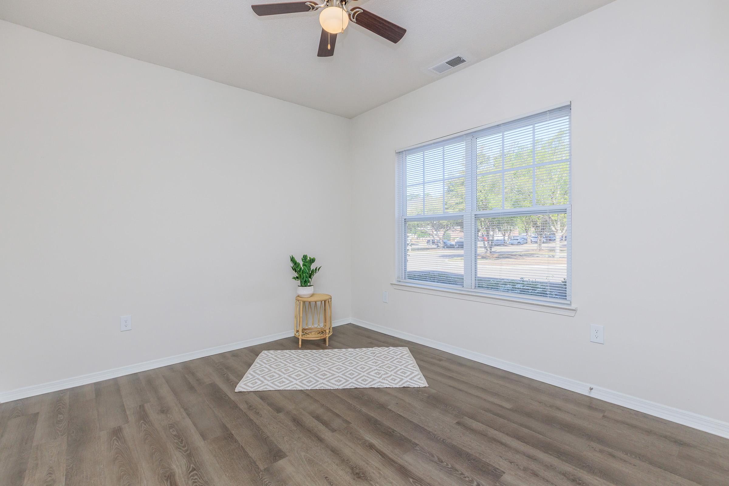 a living room next to a window