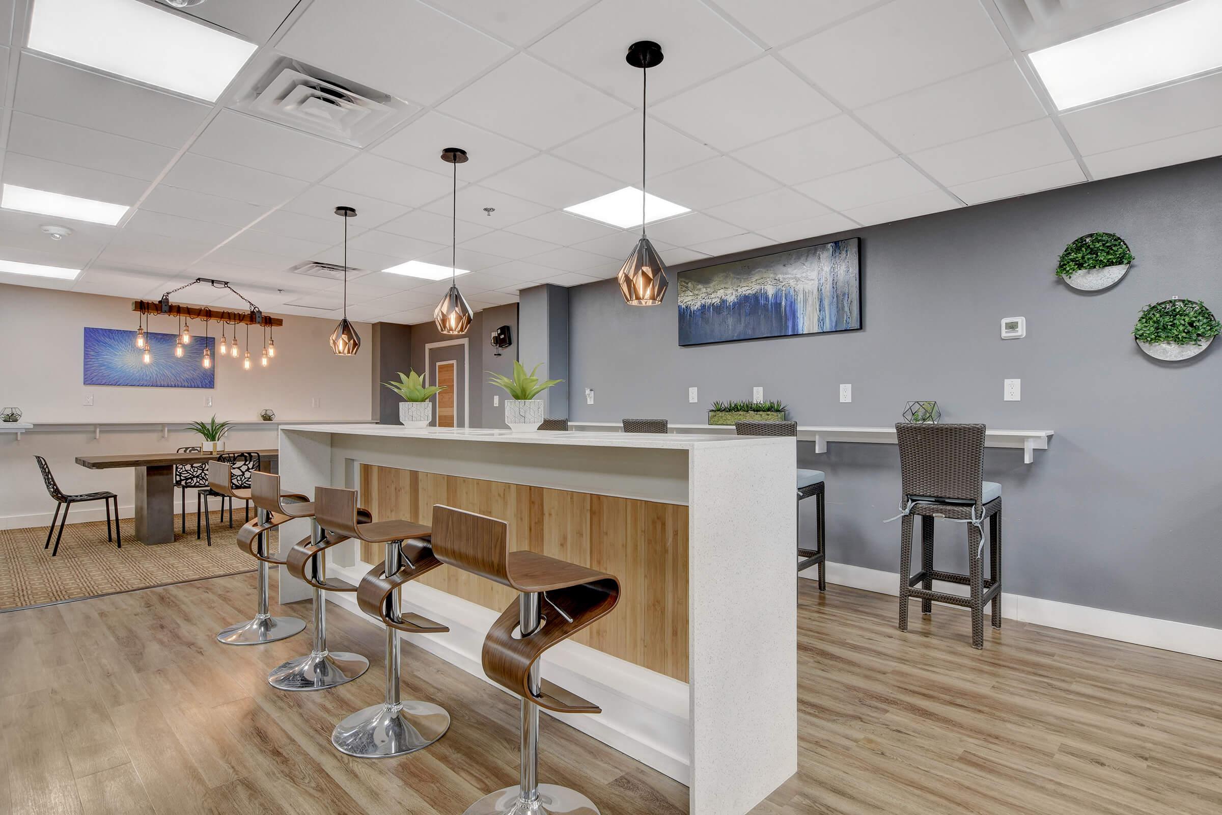 a room filled with furniture and a table