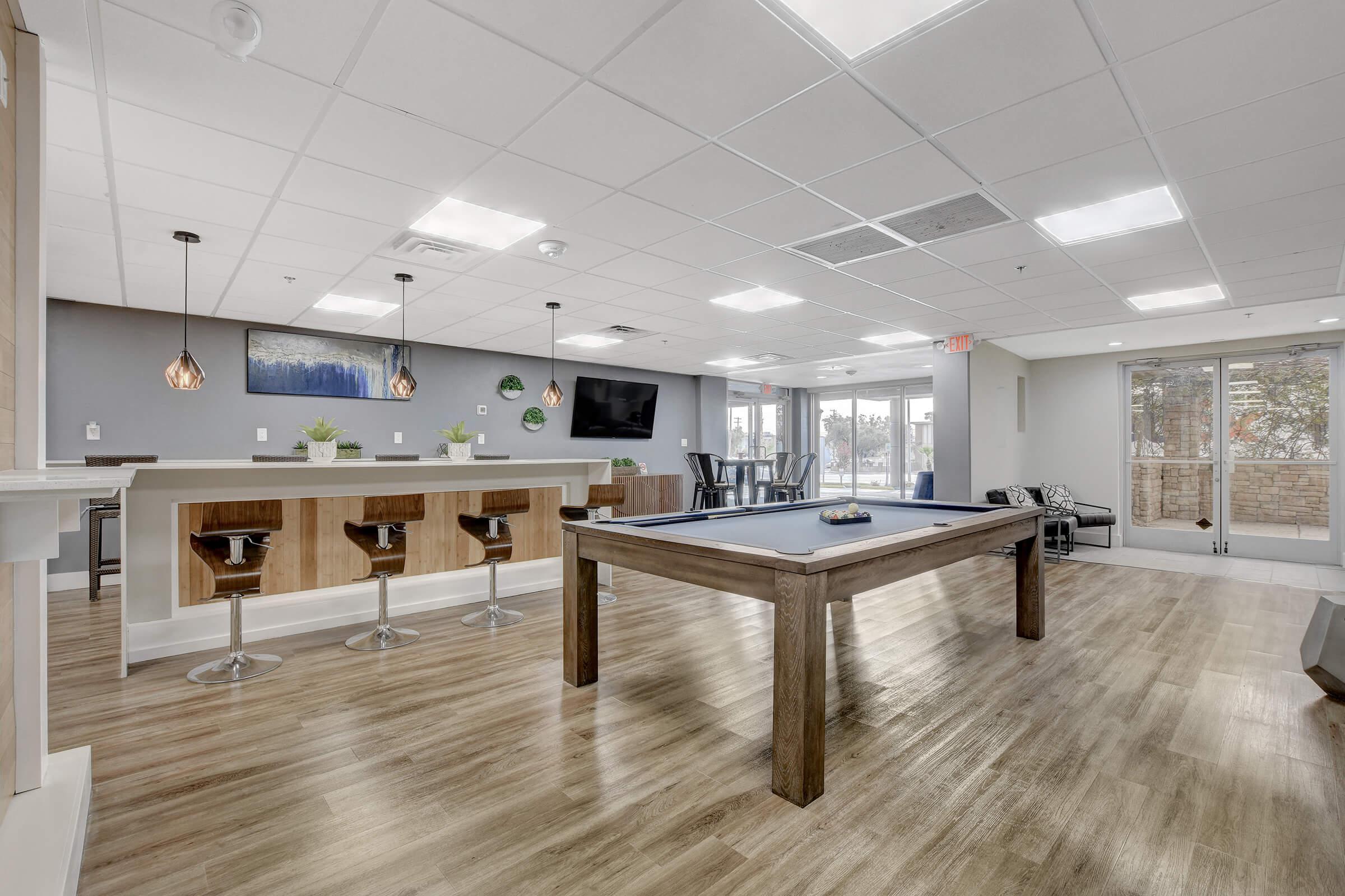 a room filled with furniture and a wood floor