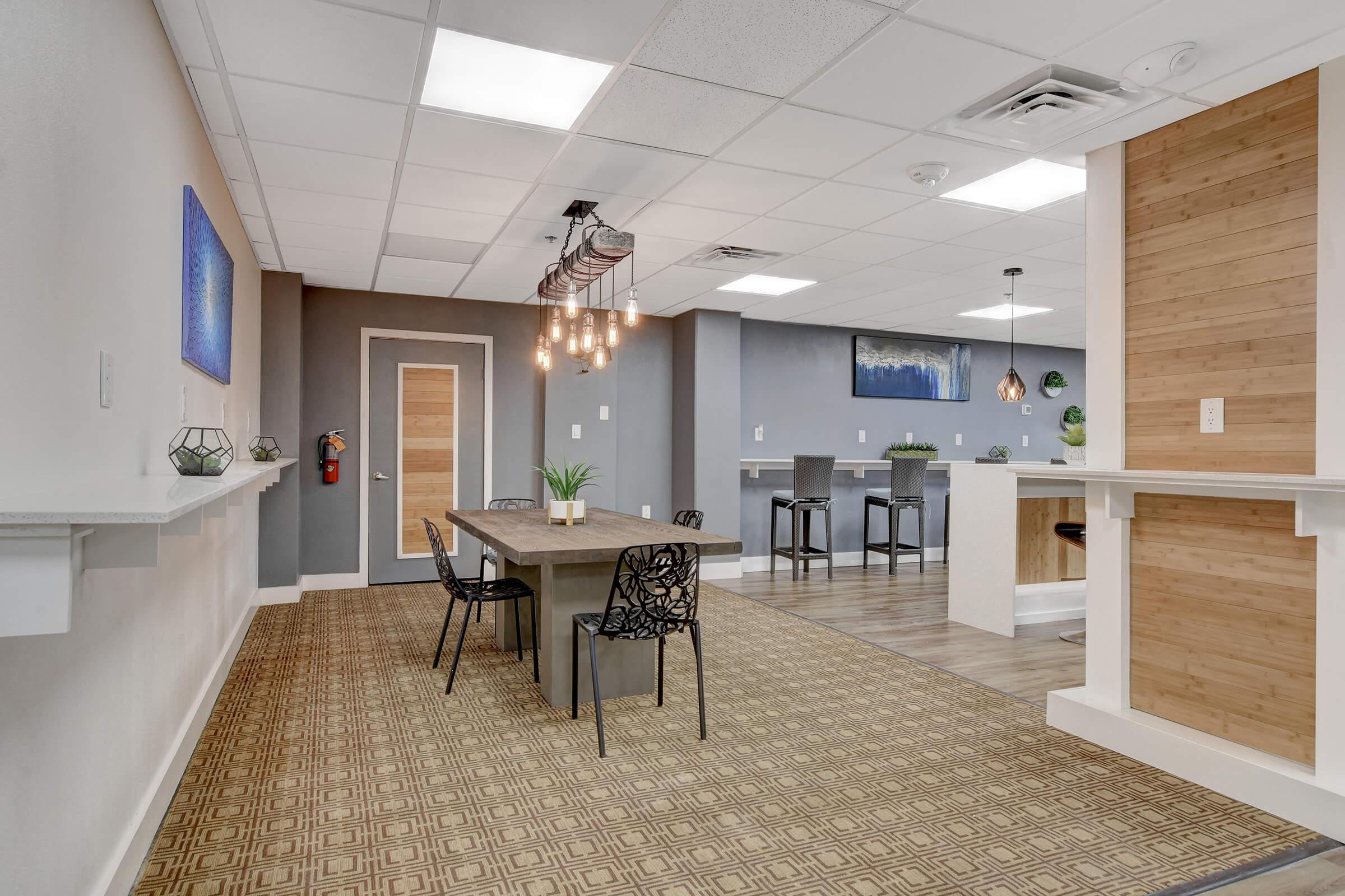 a room filled with furniture and a fireplace