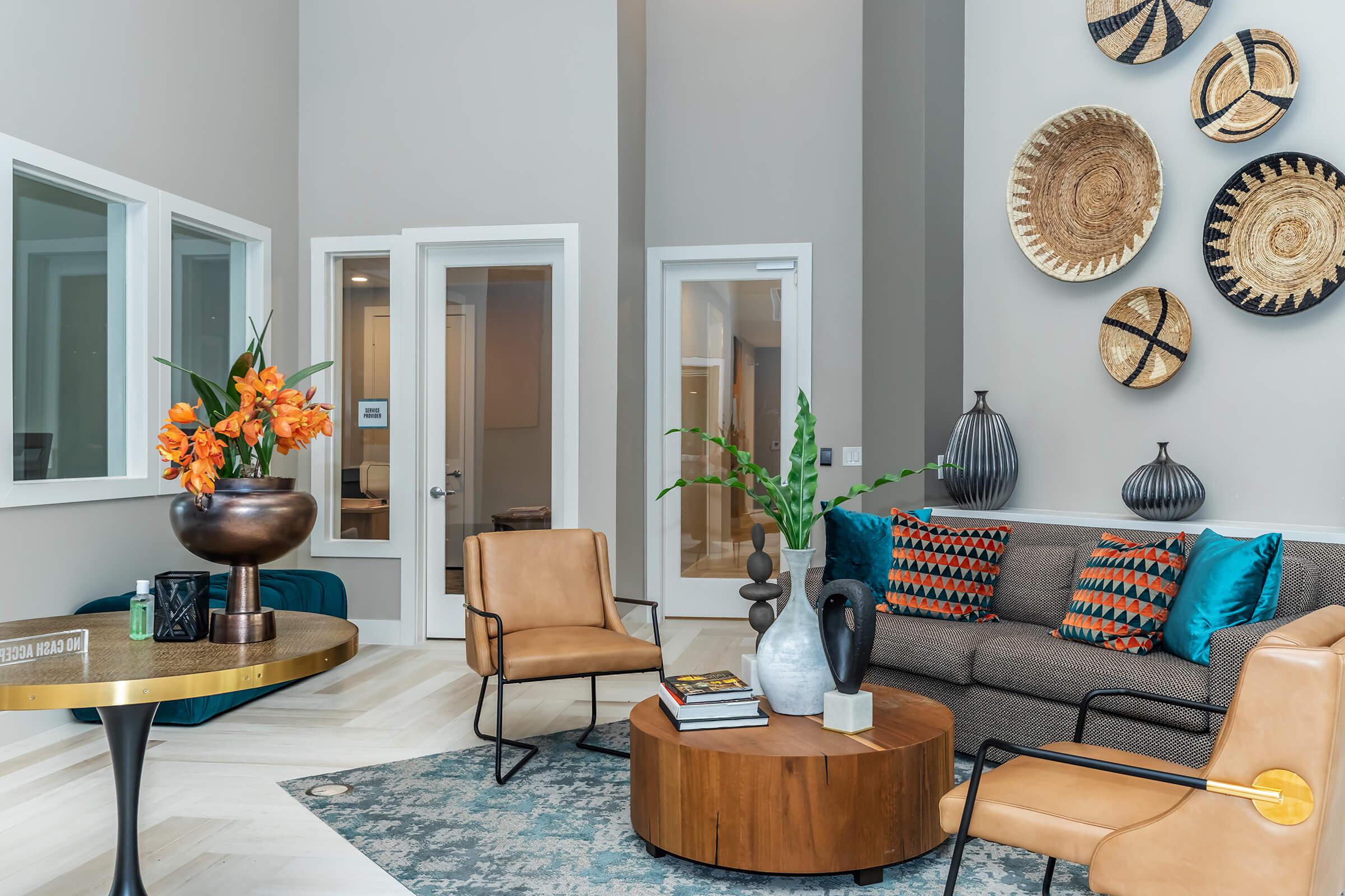 a living room filled with furniture and a fireplace