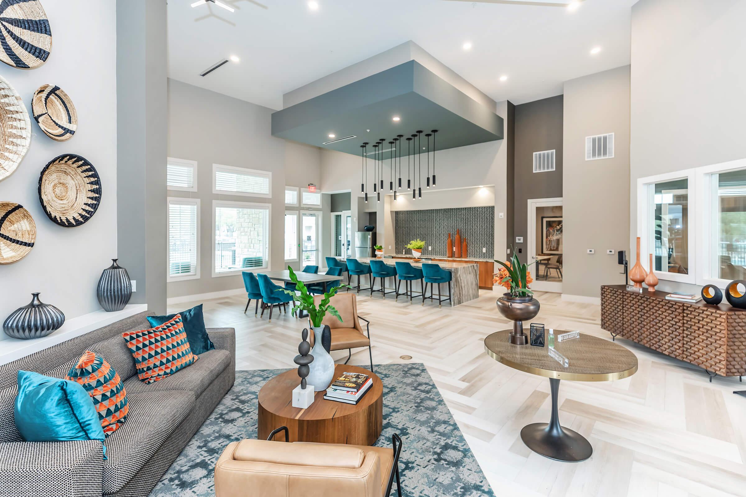 a living room filled with furniture and a fire place