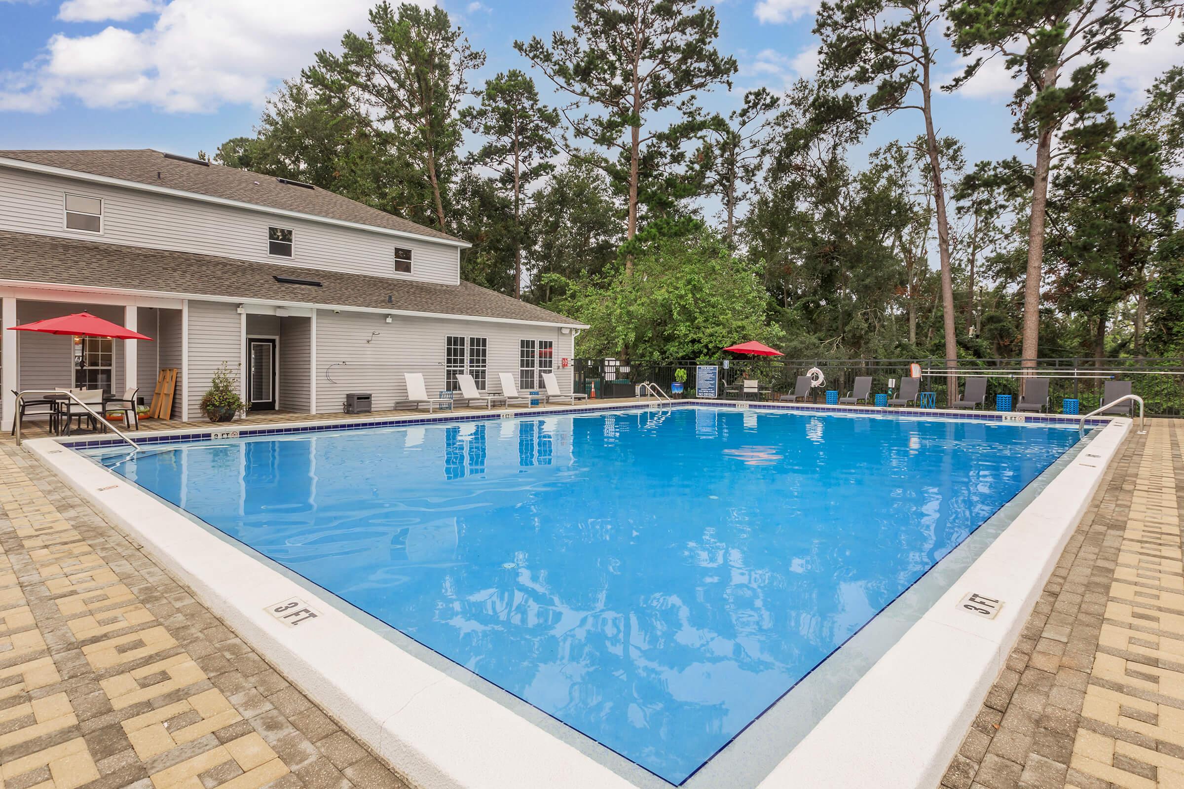 a pool next to a building