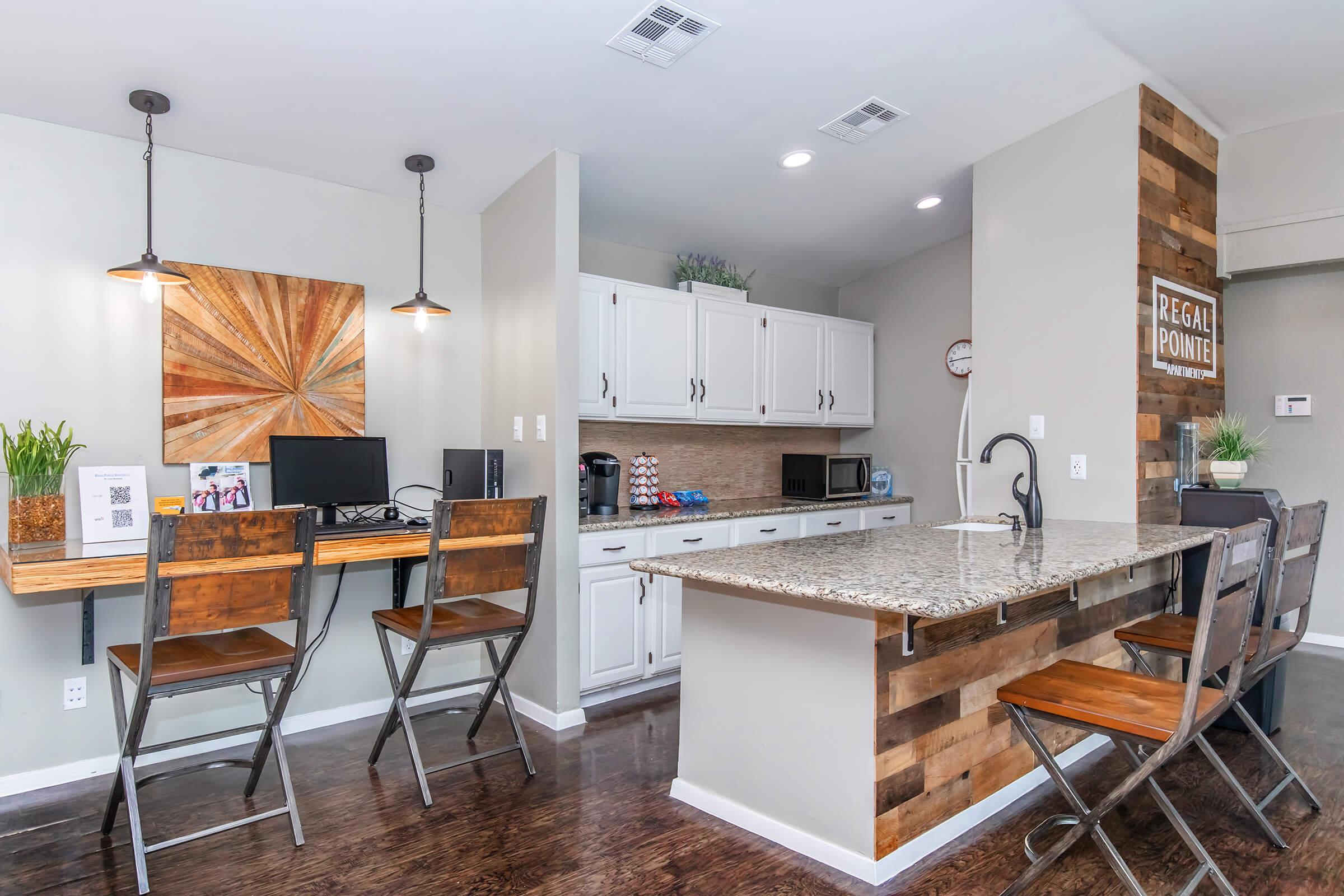 a kitchen with a dining room table