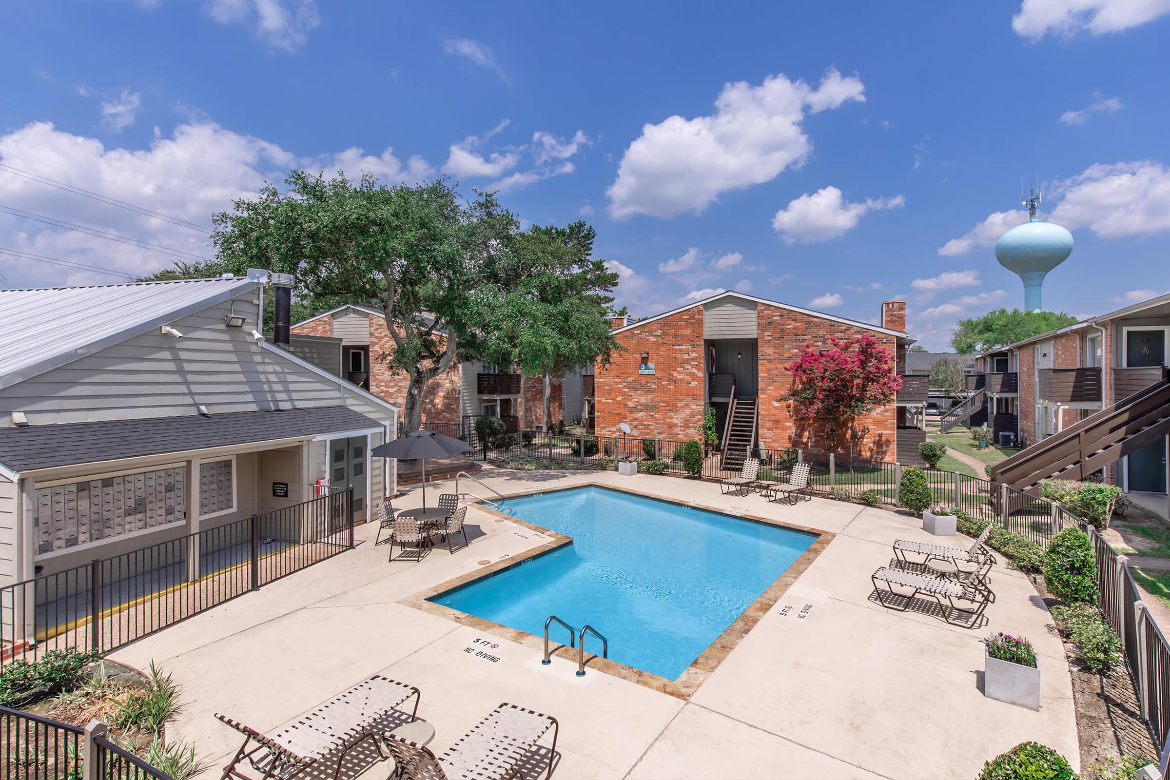 a pool next to a building