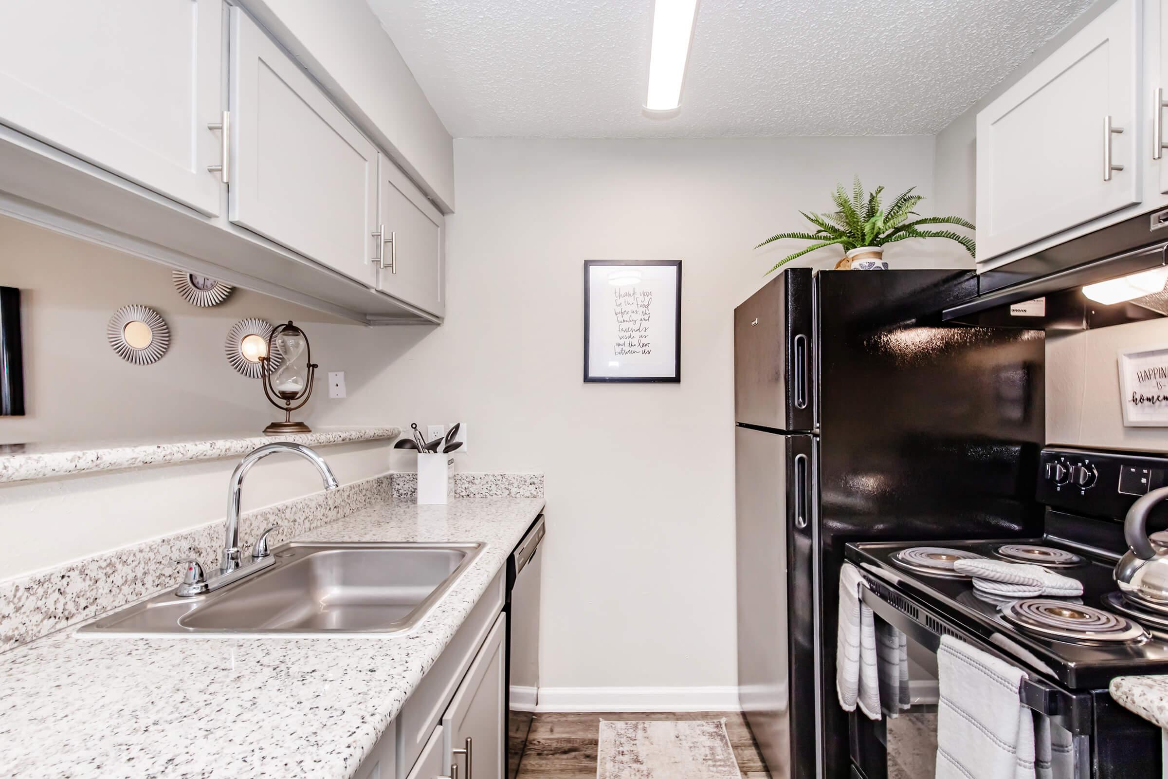 a modern kitchen with stainless steel appliances