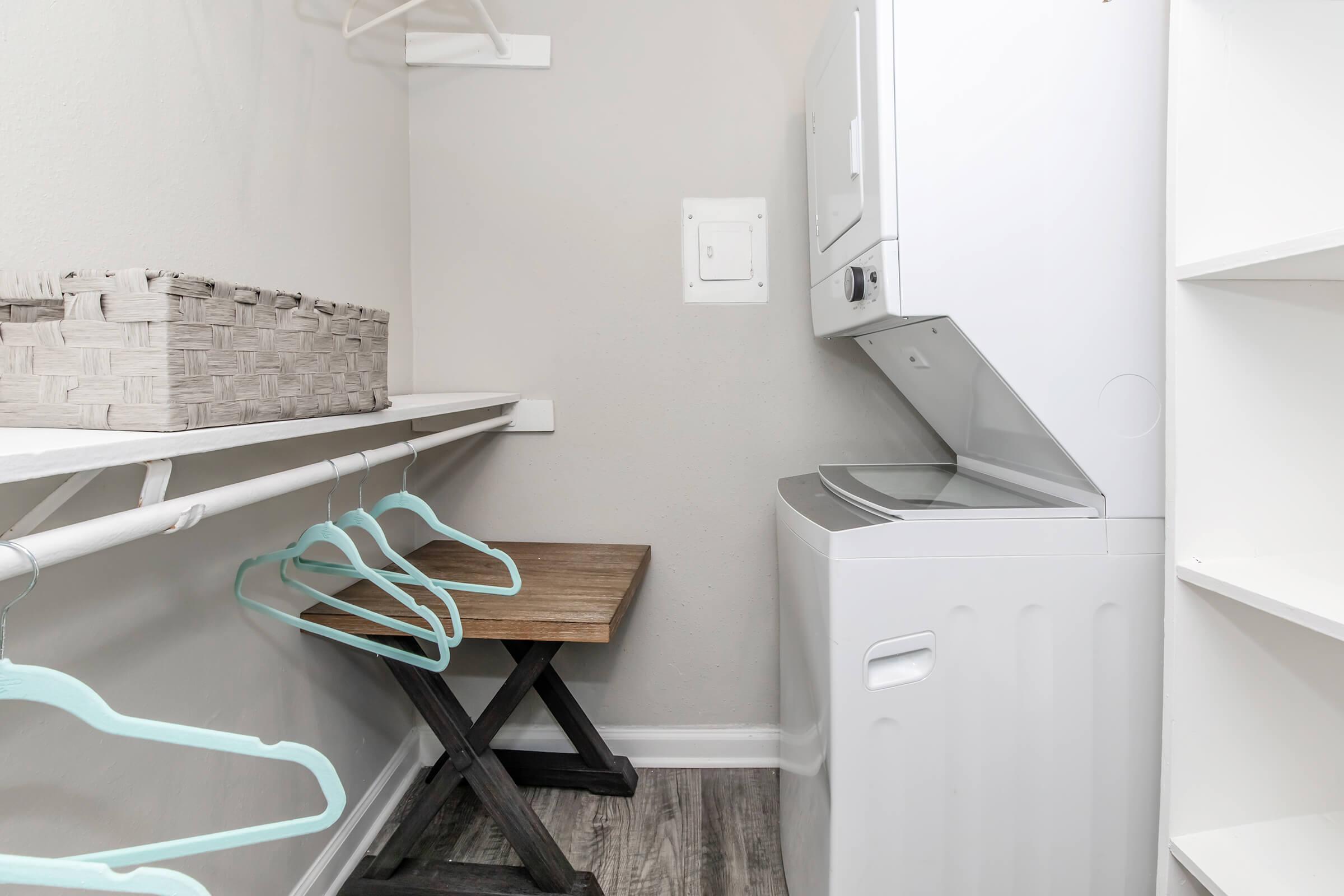 a kitchen with a sink and a refrigerator