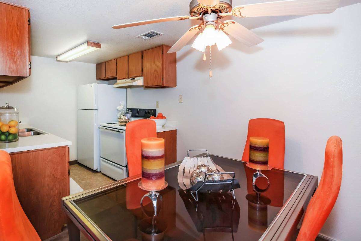 a kitchen with a table in a room