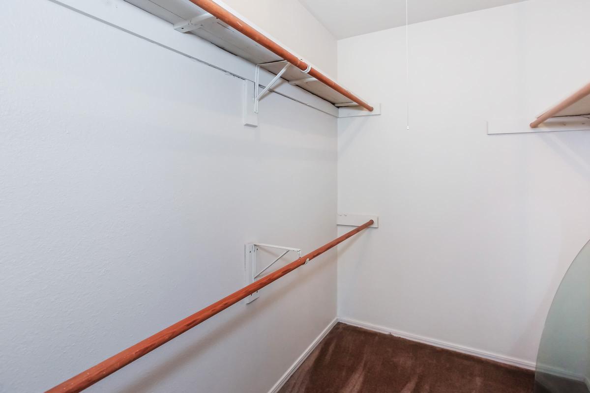 a white refrigerator freezer sitting inside of a building