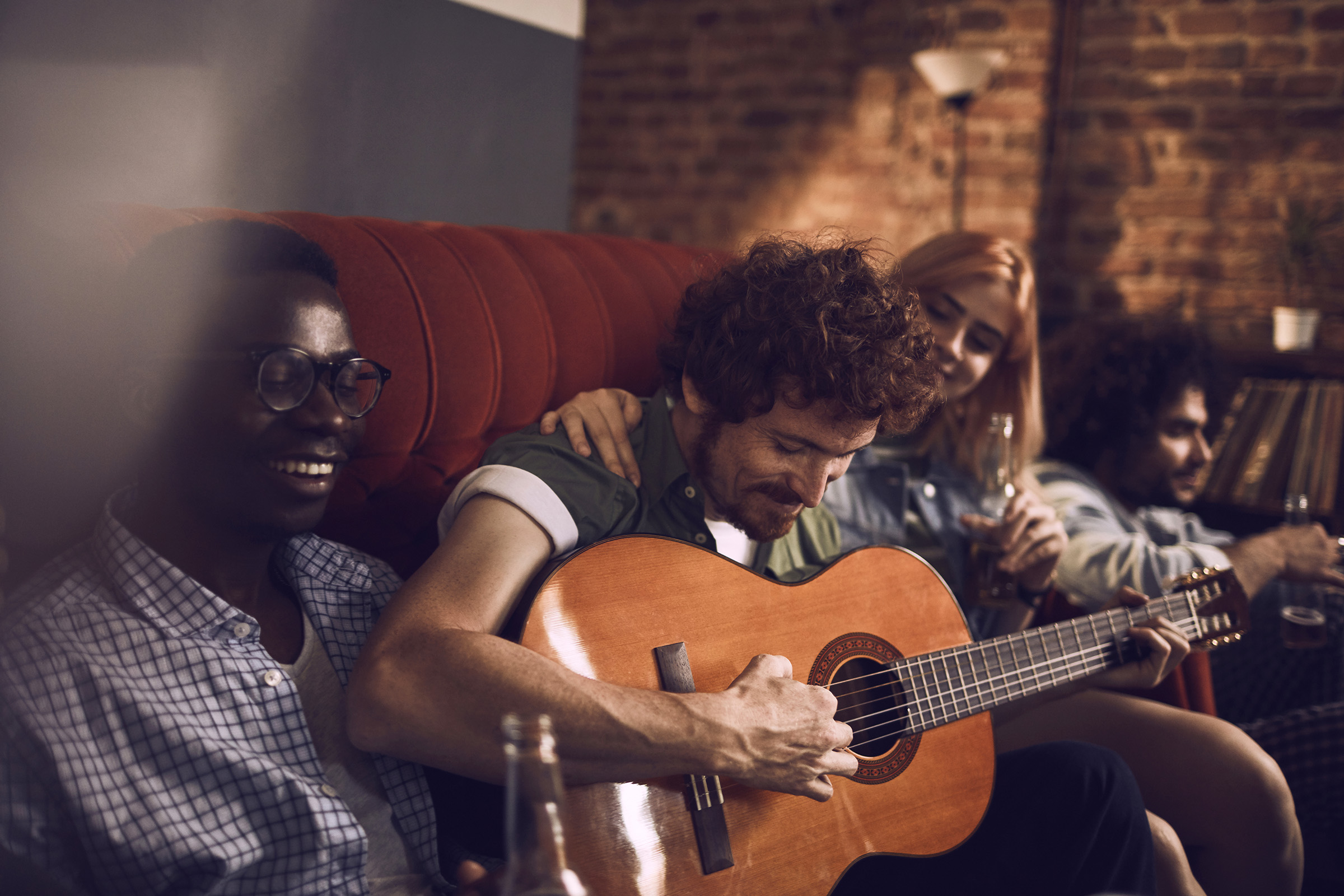 a man holding a guitar