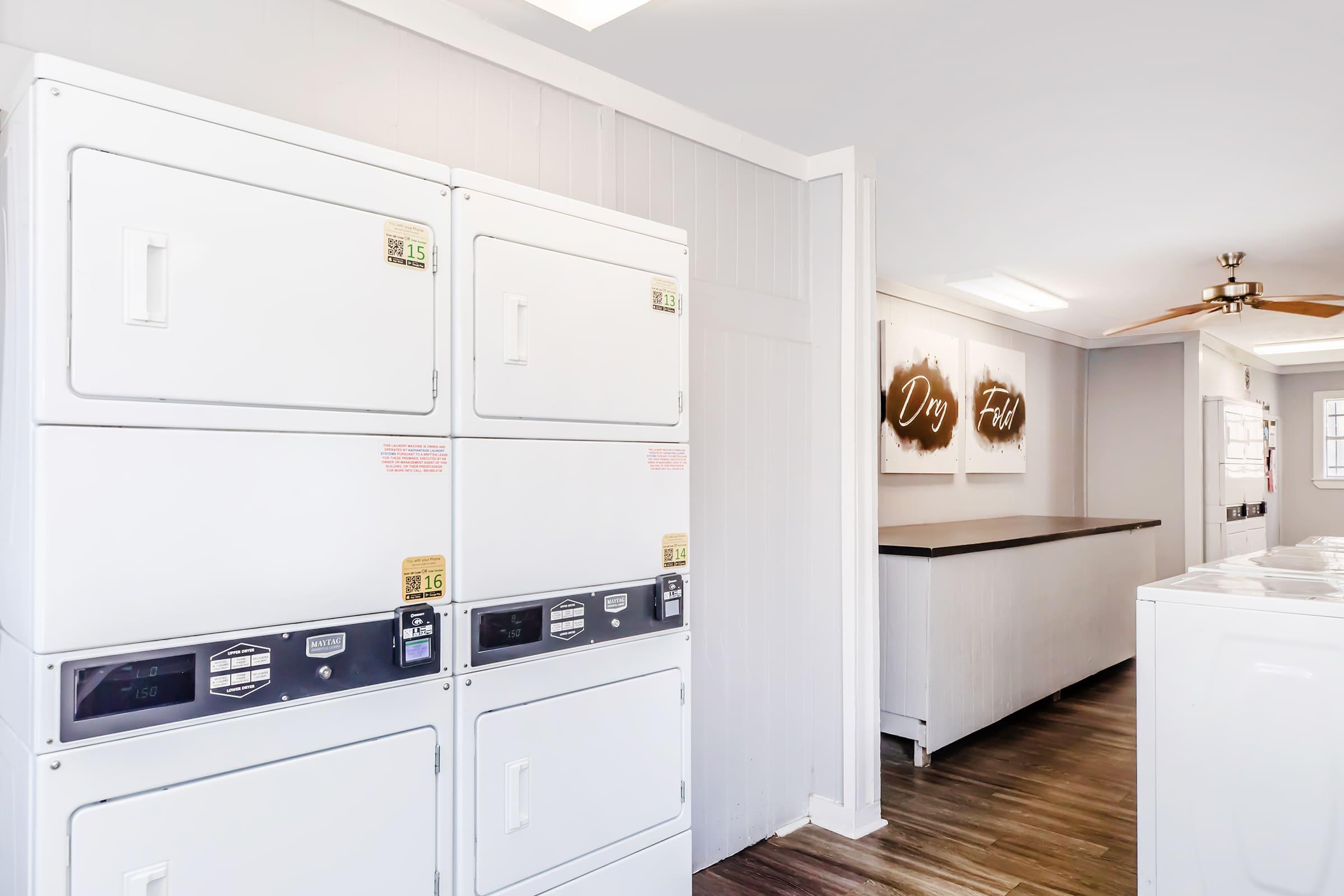 a kitchen with a stove and a refrigerator