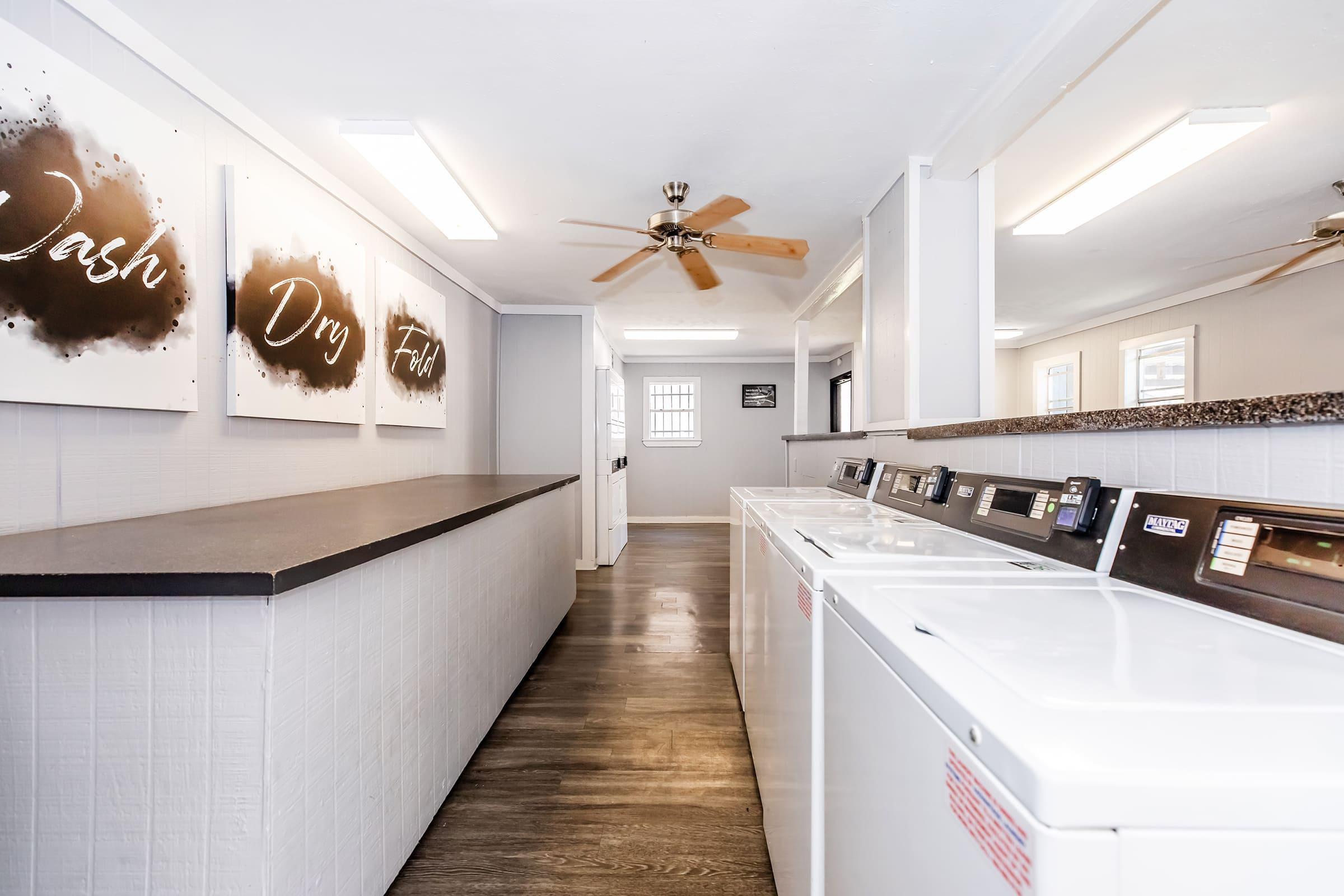 a kitchen with a table in a room