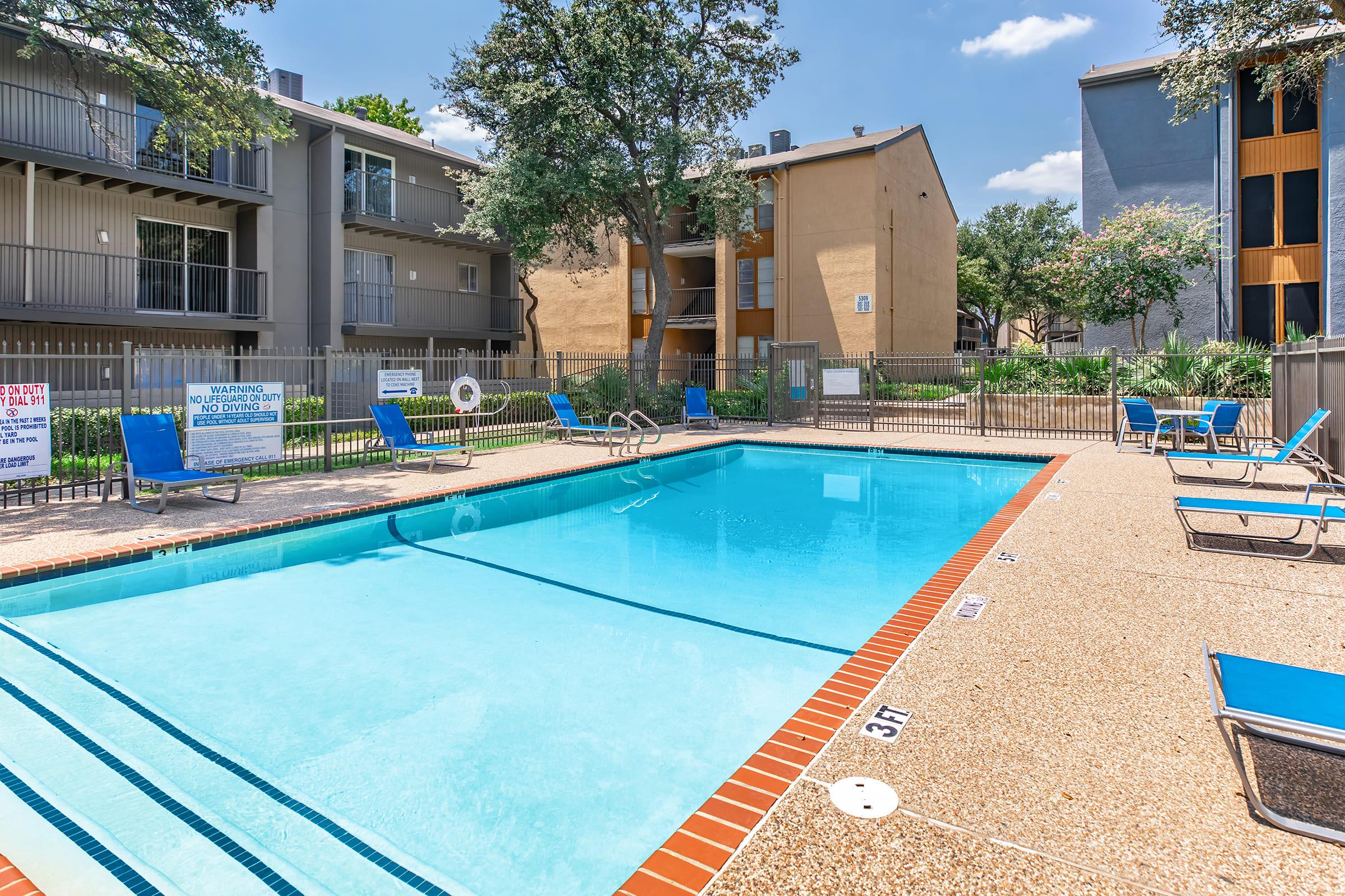 a pool in front of a building