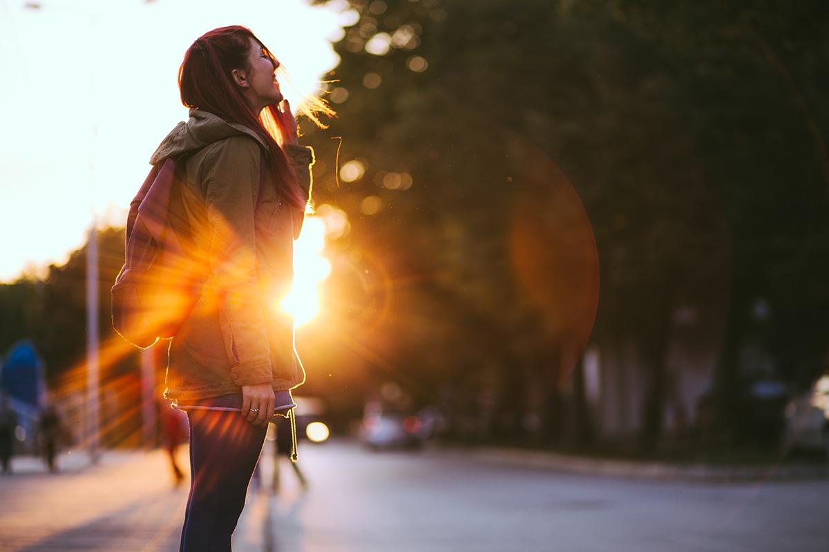 a blurry image of a person walking down a street