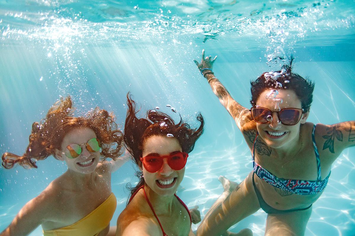 people swimming in the water