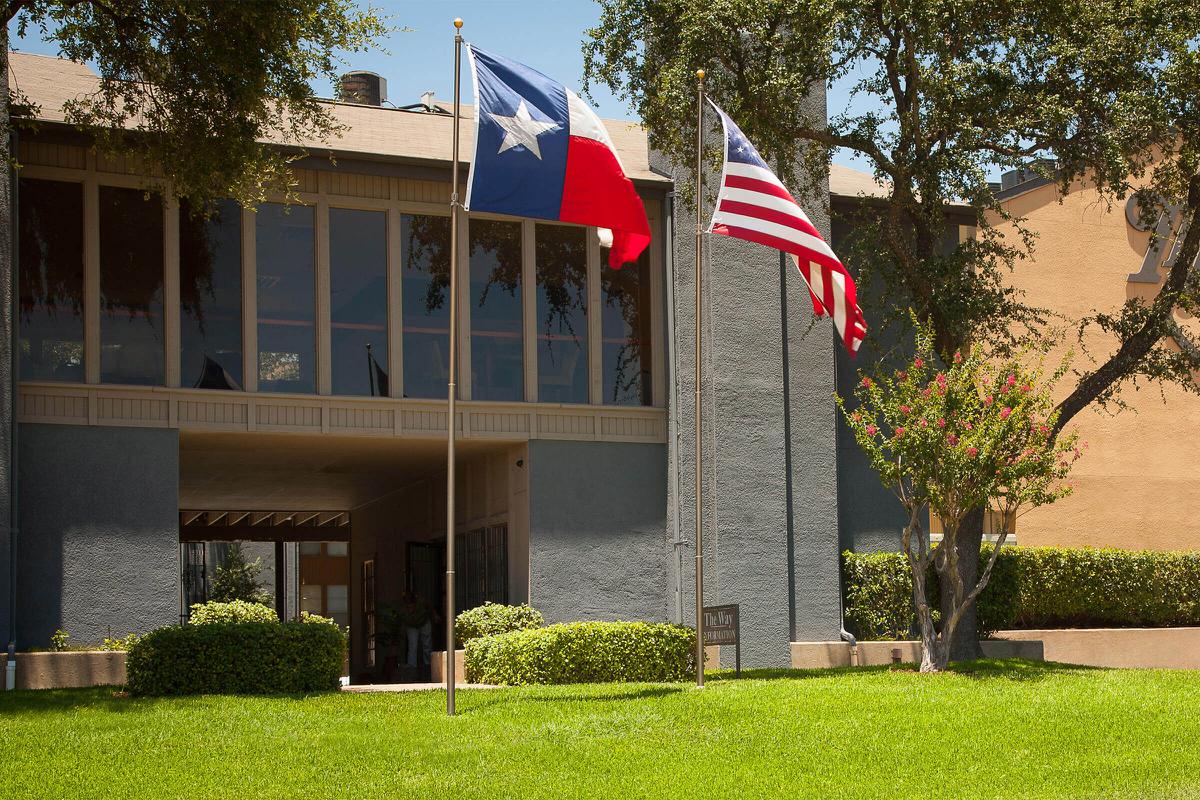 the leasing office with flags