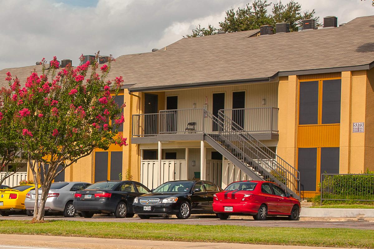 community building with green grass