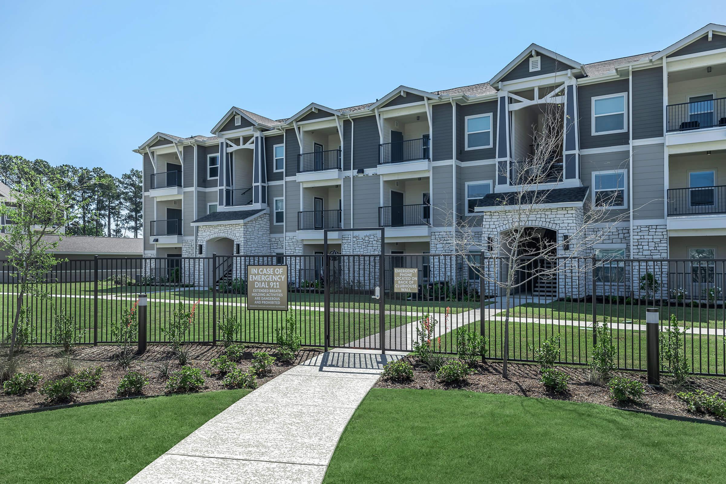 a large lawn in front of a house