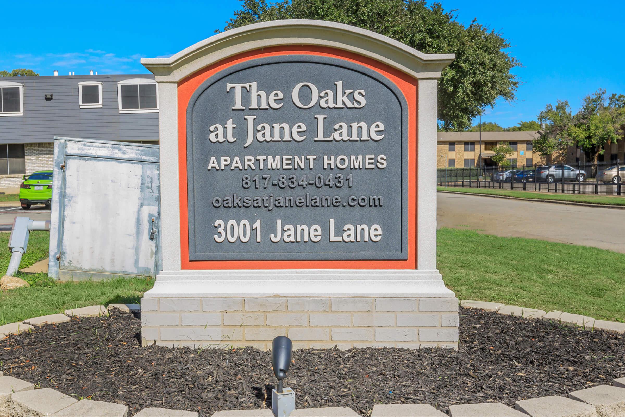 a sign on a sidewalk