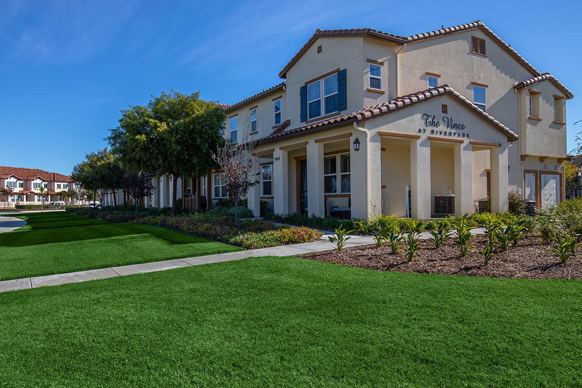 a large lawn in front of a house