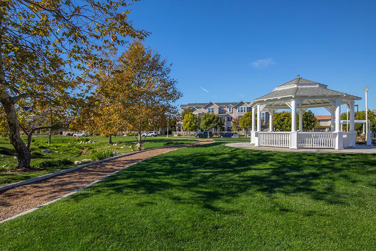 a building with a grassy field