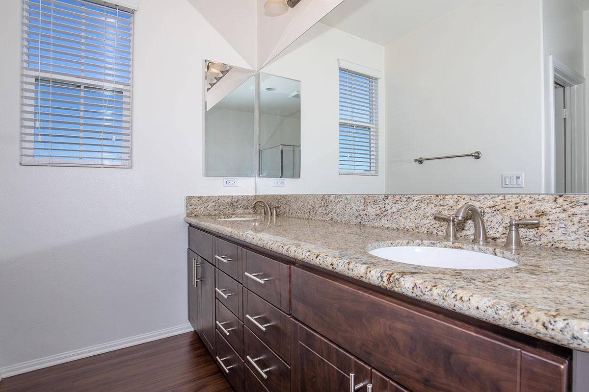 a kitchen with a sink and a window