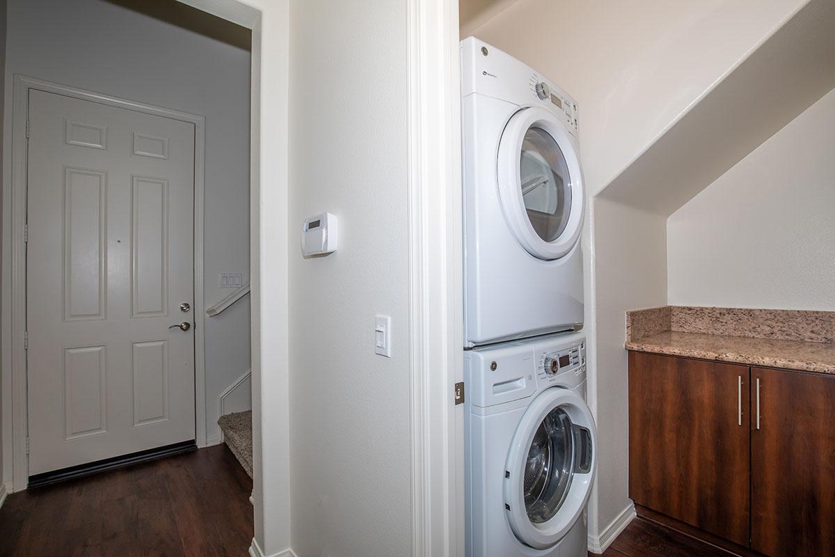 a kitchen with a sink and a microwave